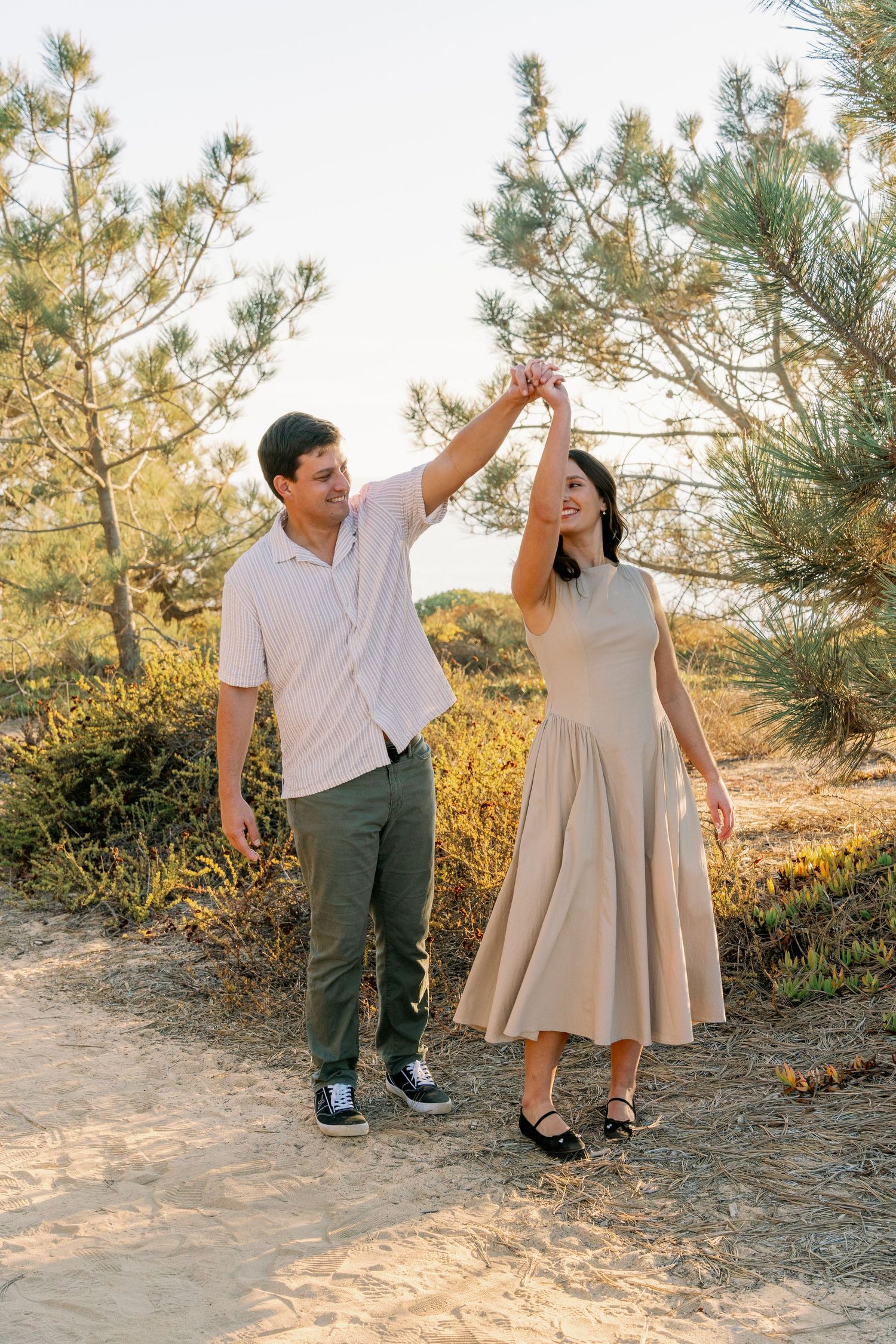 Couple's professional beach photoshoot at Torrey Pines Beach in San Diego, California
