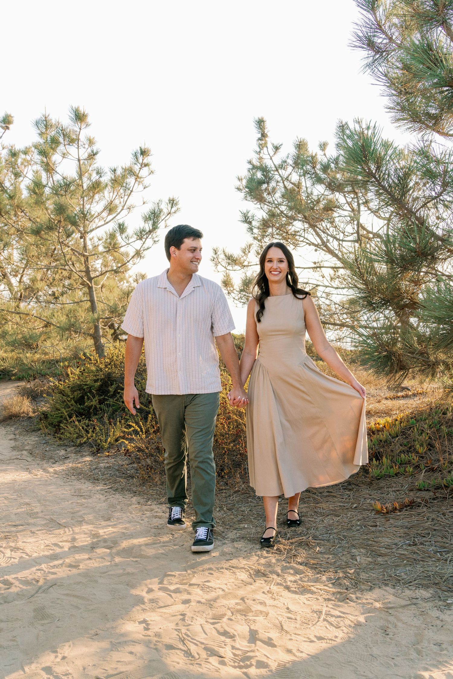 Couple's professional beach photoshoot at Torrey Pines Beach in San Diego, California