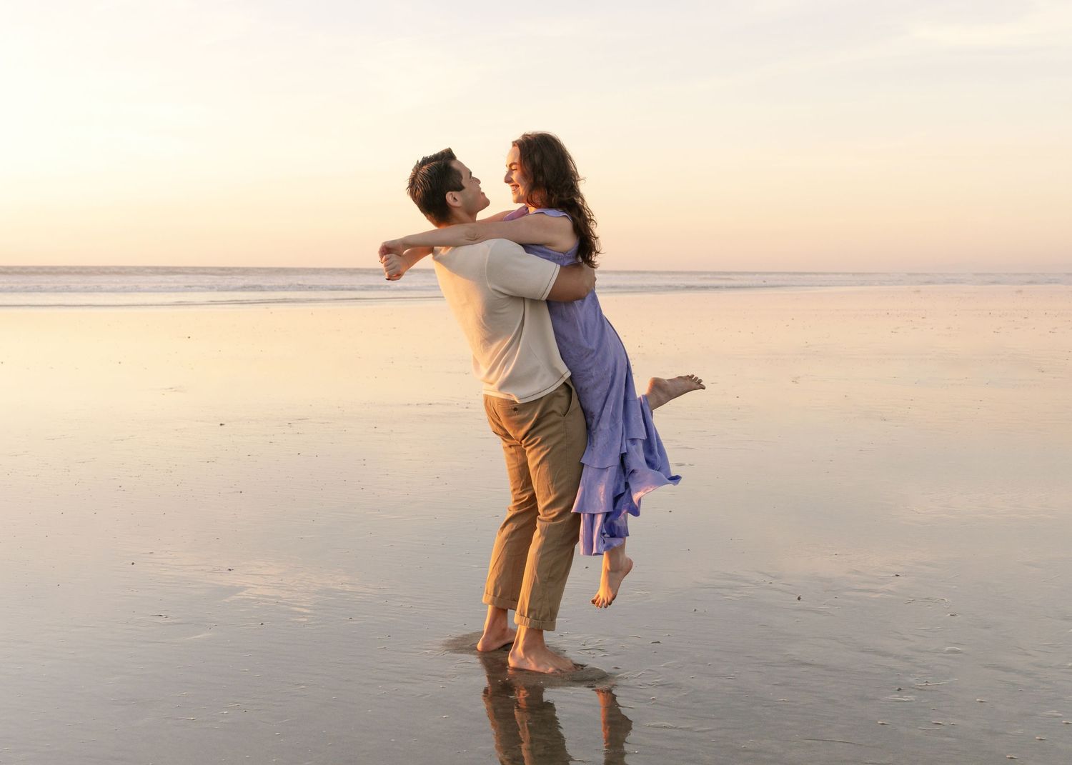 Couple's professional beach photoshoot at Del Mar Beach in San Diego, California