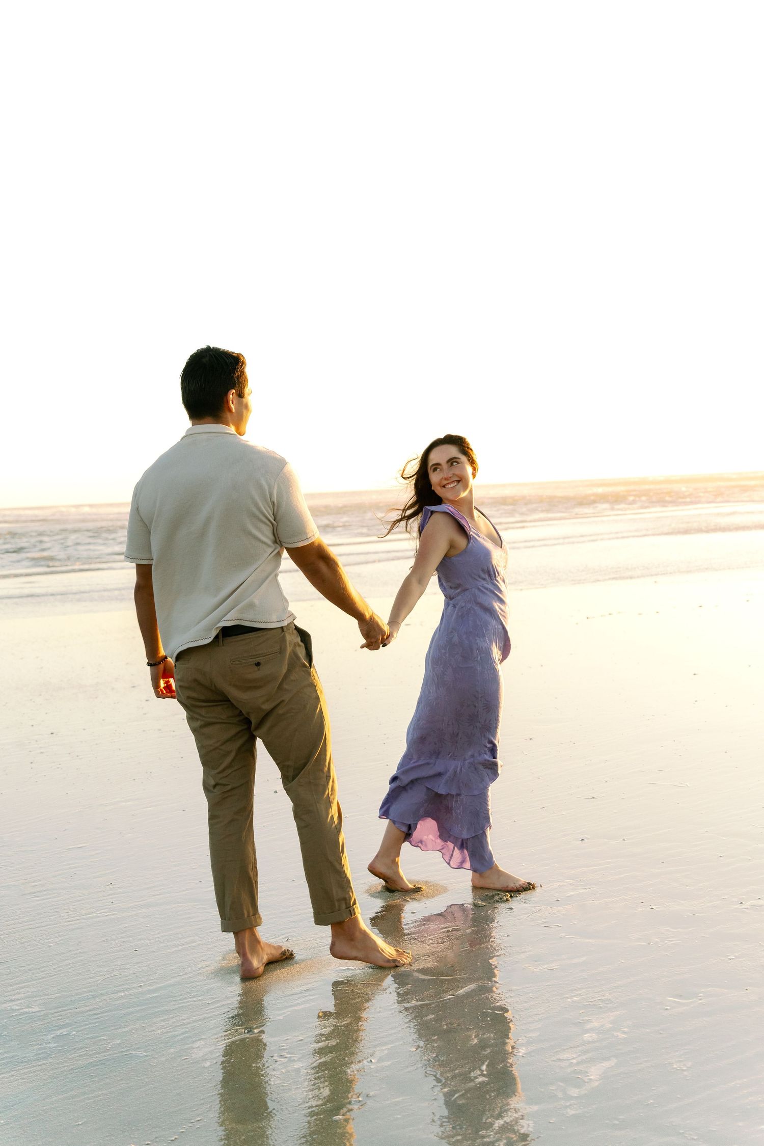 Couple's professional beach photoshoot at Del Mar Beach in San Diego, California