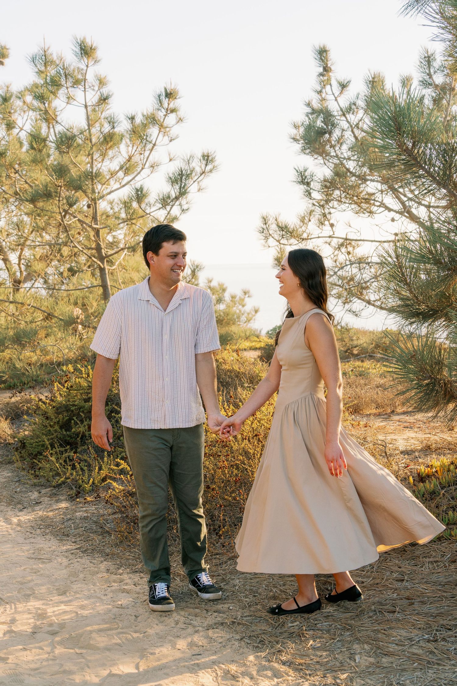 Couple's professional beach photoshoot at Torrey Pines Beach in San Diego, California