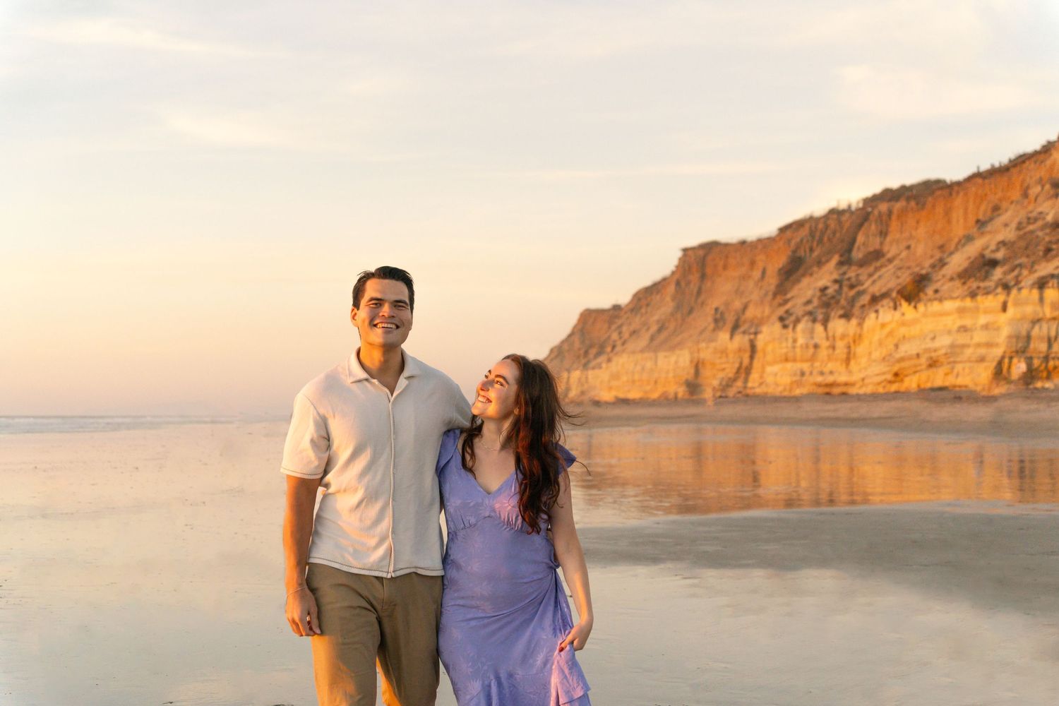 Couple's professional beach photoshoot at Del Mar Beach in San Diego, California