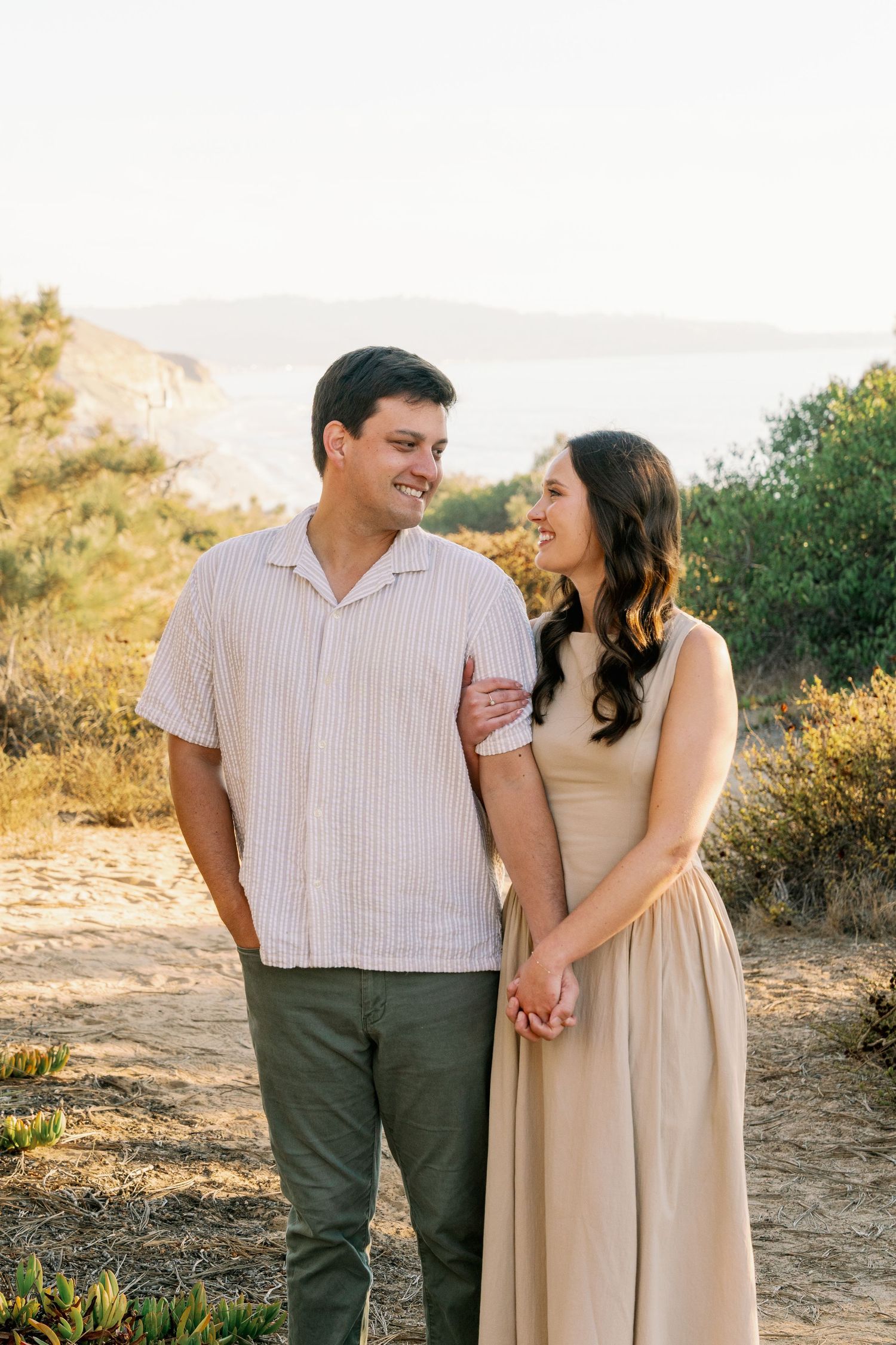 Couple's professional beach photoshoot at Torrey Pines Beach in San Diego, California