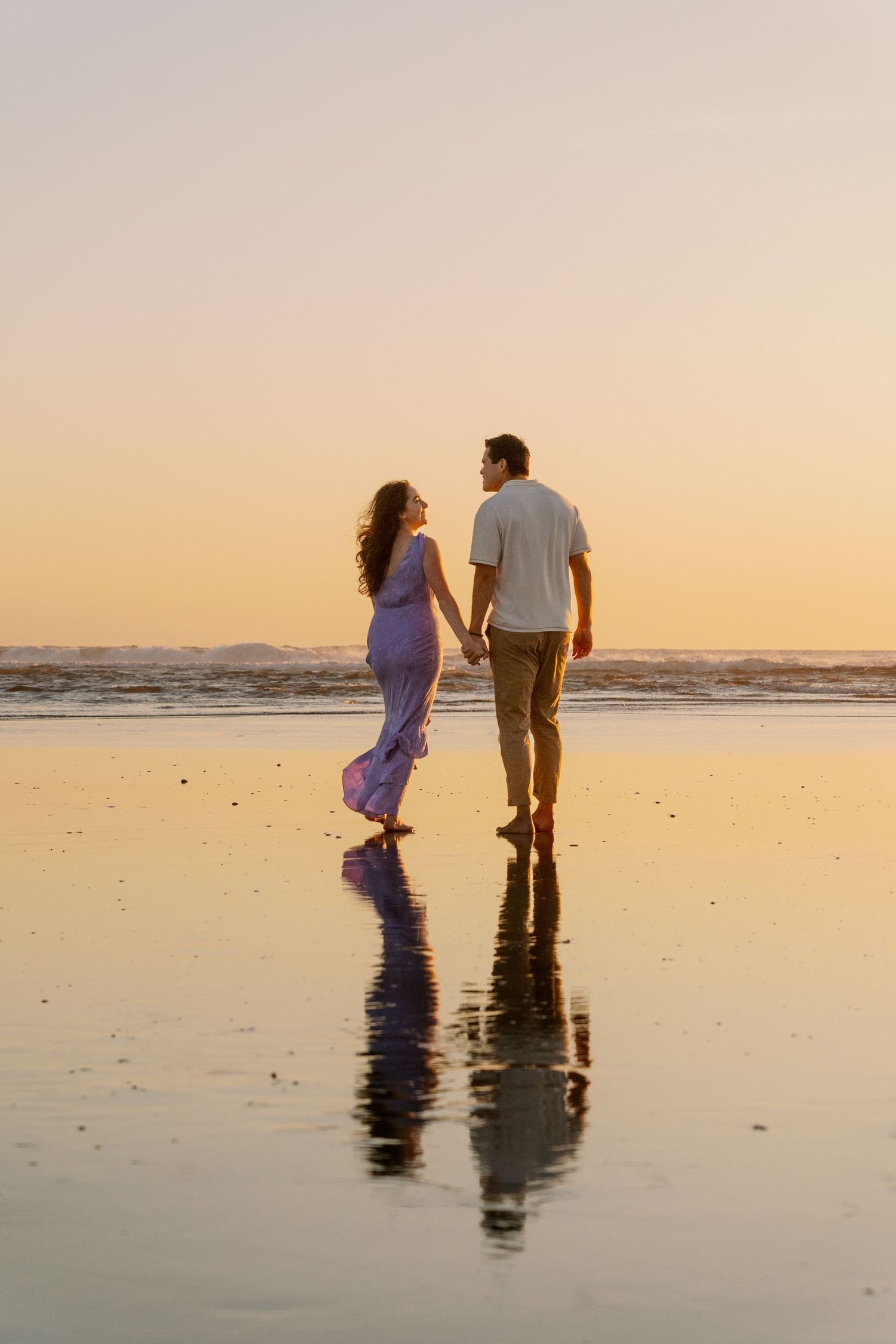 Couple's professional beach photoshoot at Del Mar Beach in San Diego, California