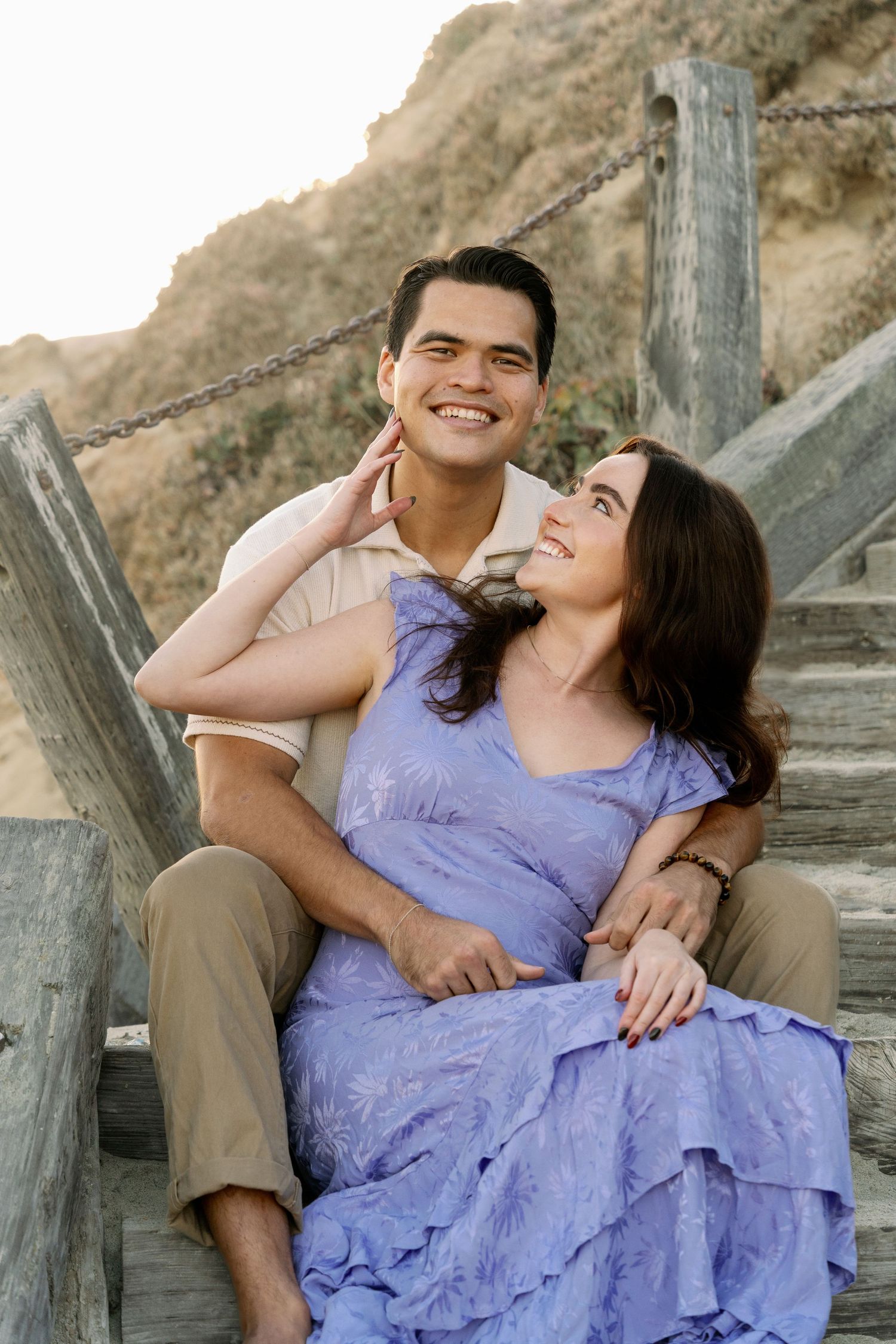 Couple's professional beach photoshoot at Del Mar Beach in San Diego, California