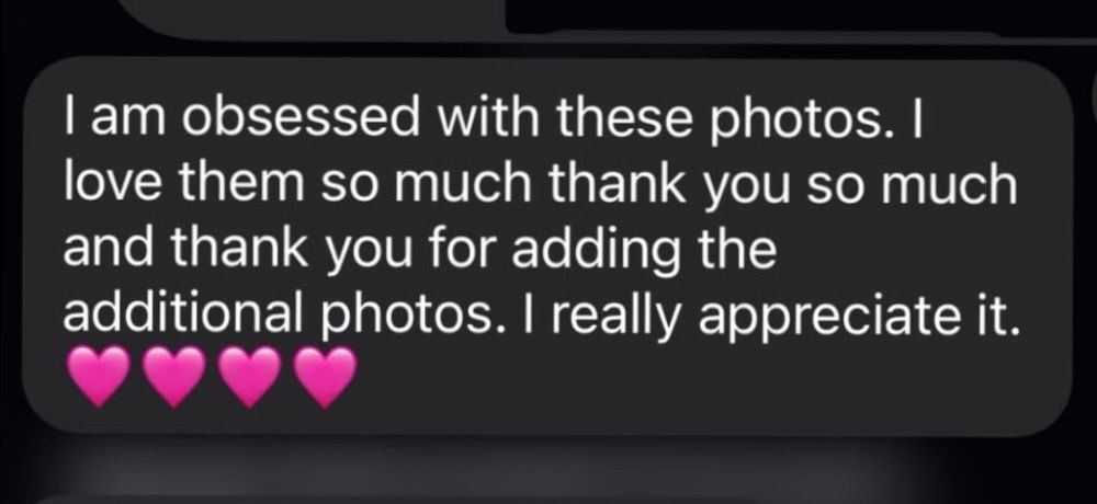 A glowing five-star customer review message expressing obsession and appreciation for photos with pink heart emojis.