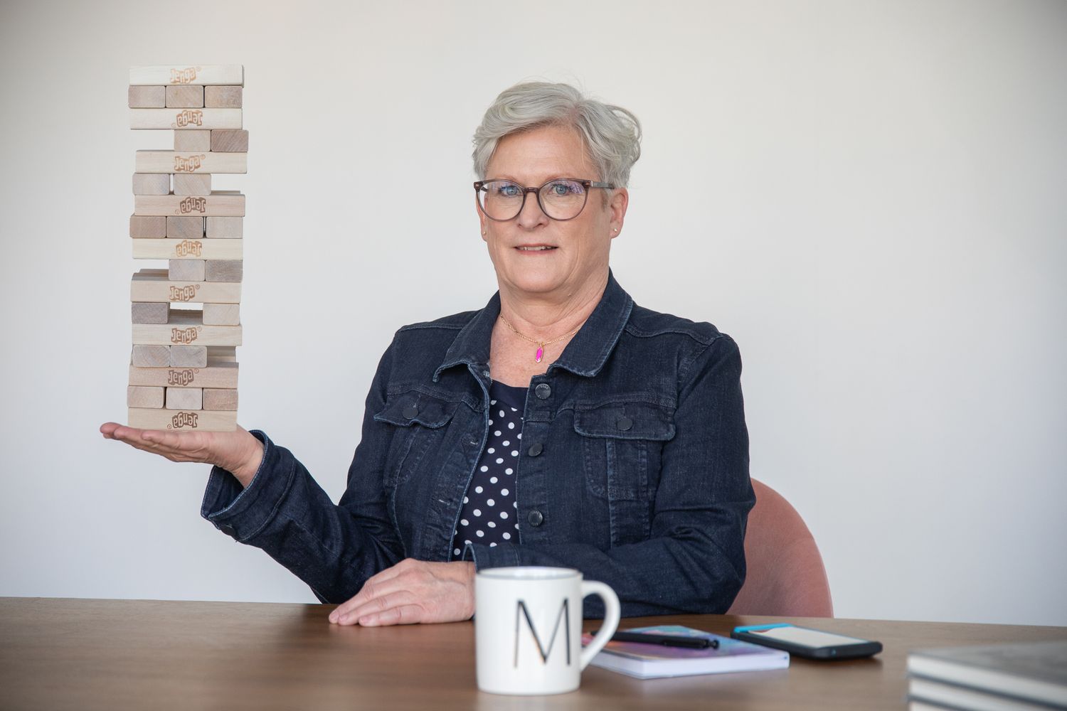 Brand Photos of a Virtual Assistant, juggling multiple priorities like a Jenga master without breaking a sweat.