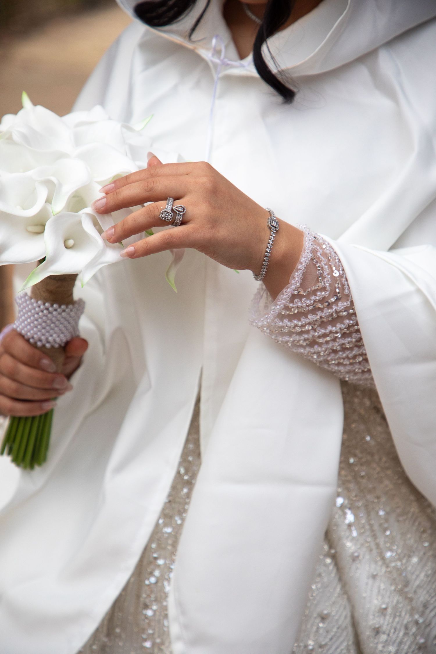 bride touching flowers