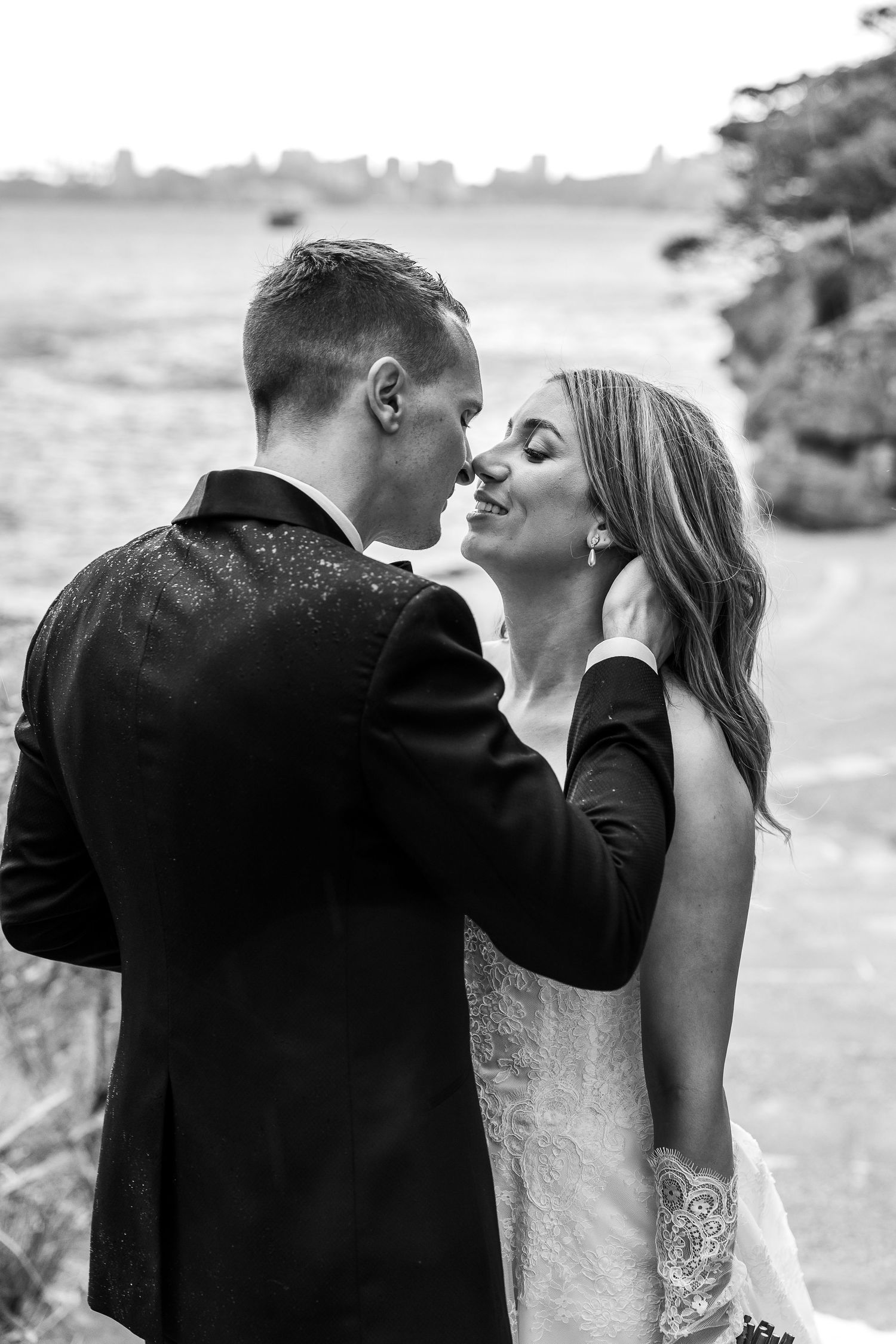 Wedding and groom passionately kissing, candid wedding photo