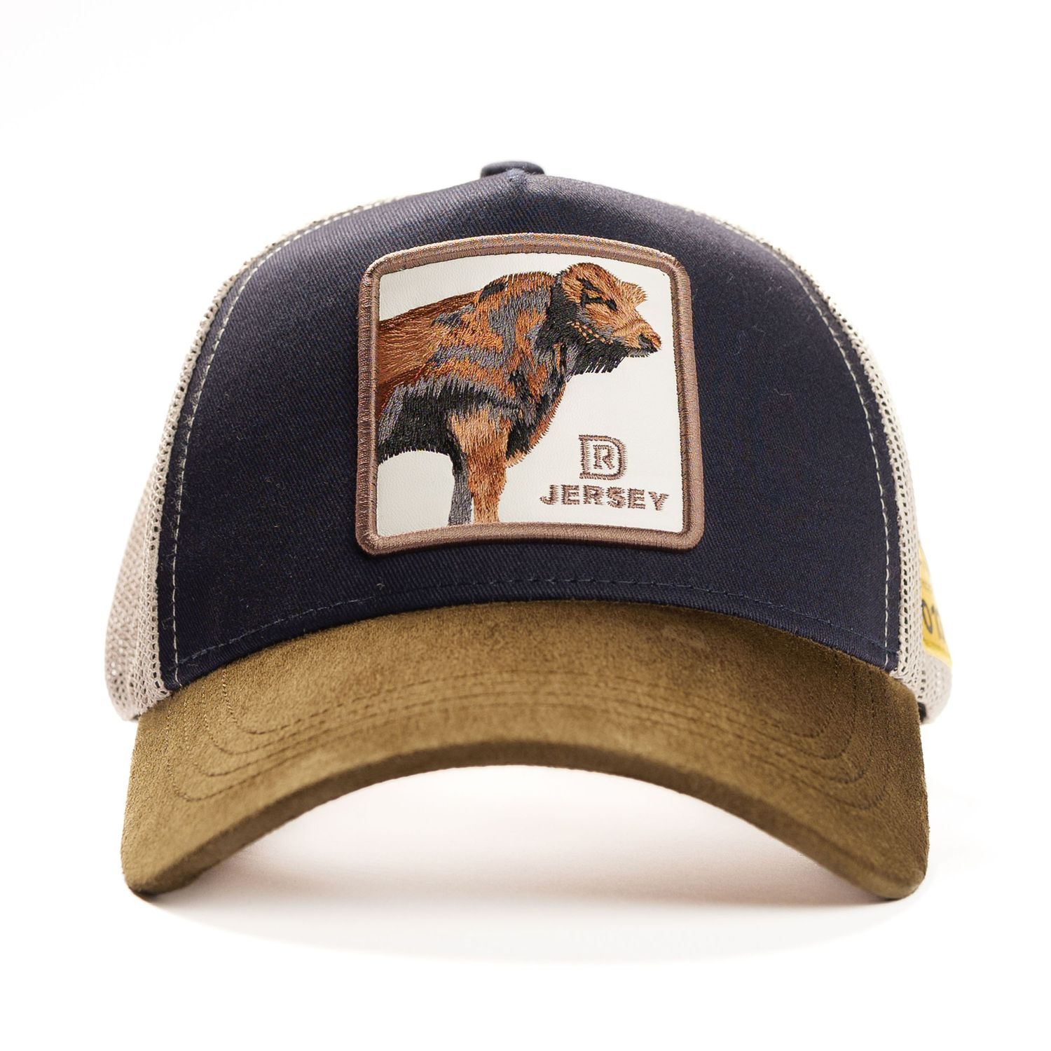 Navy and tan baseball cap with buffalo patch emblem on mesh backing.