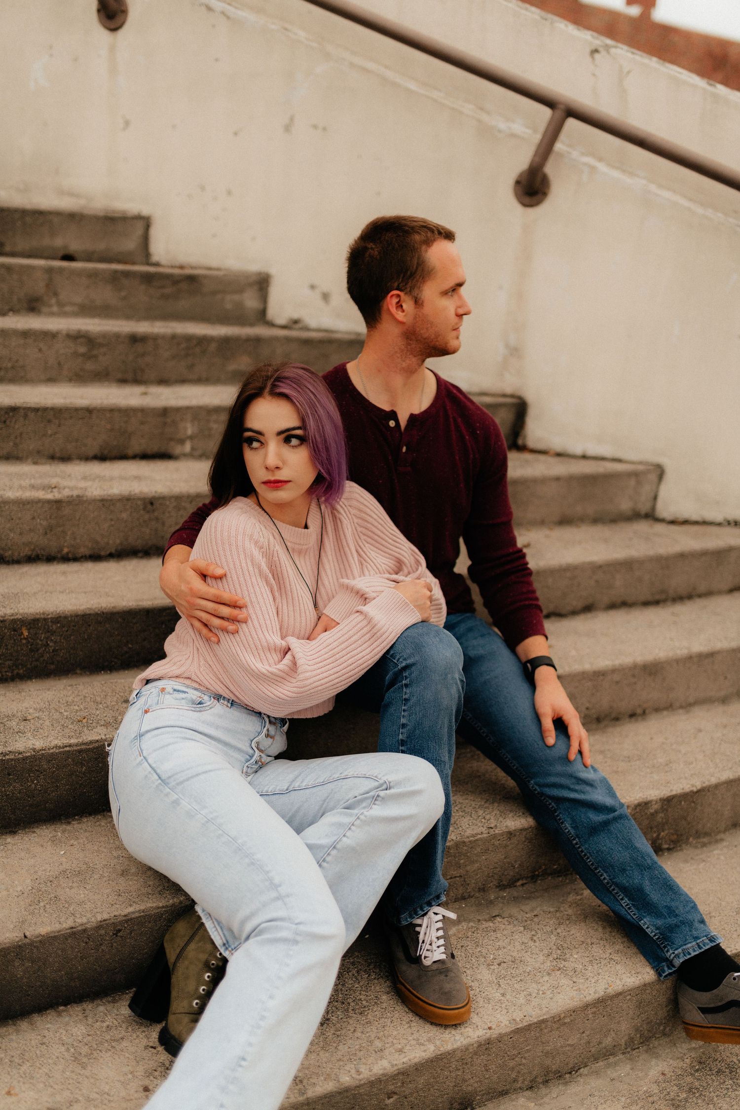 Couple on steps in historic downtown Rome, Georgia