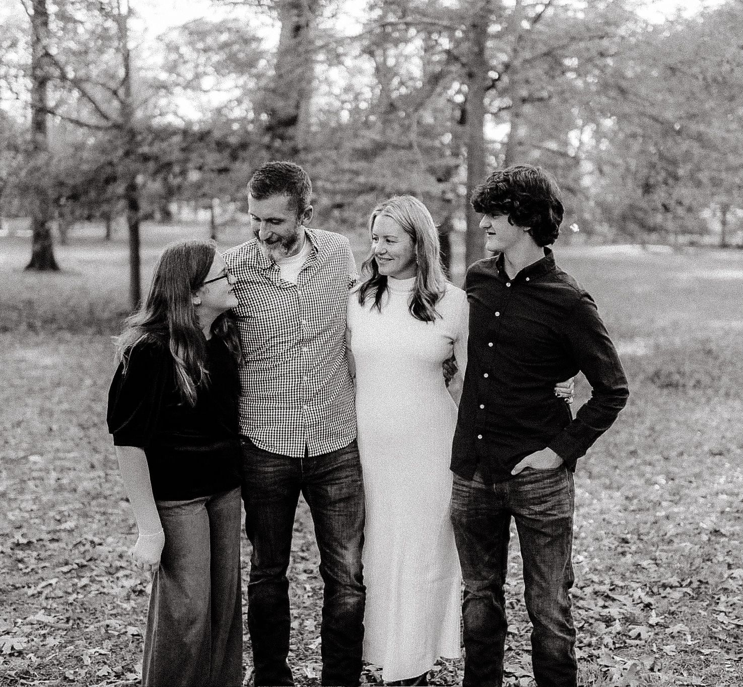 A black and white lifestyle family portrait session captured outdoors at Berry College in Rome, Georgia by Ella Monroe Photography