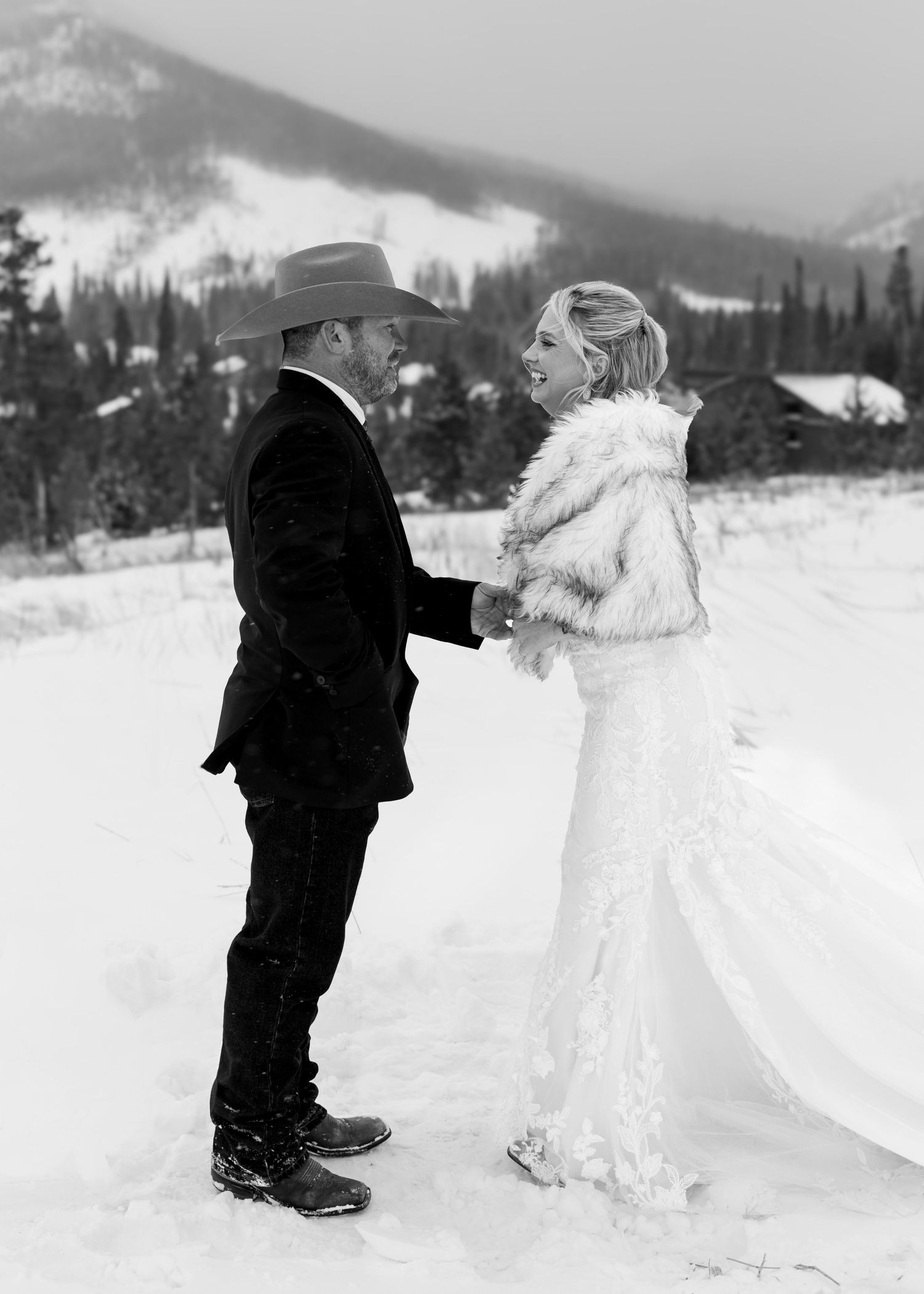 A sequence of photos showing two figures building a snowman together in a snowy winter landscape with mountains.