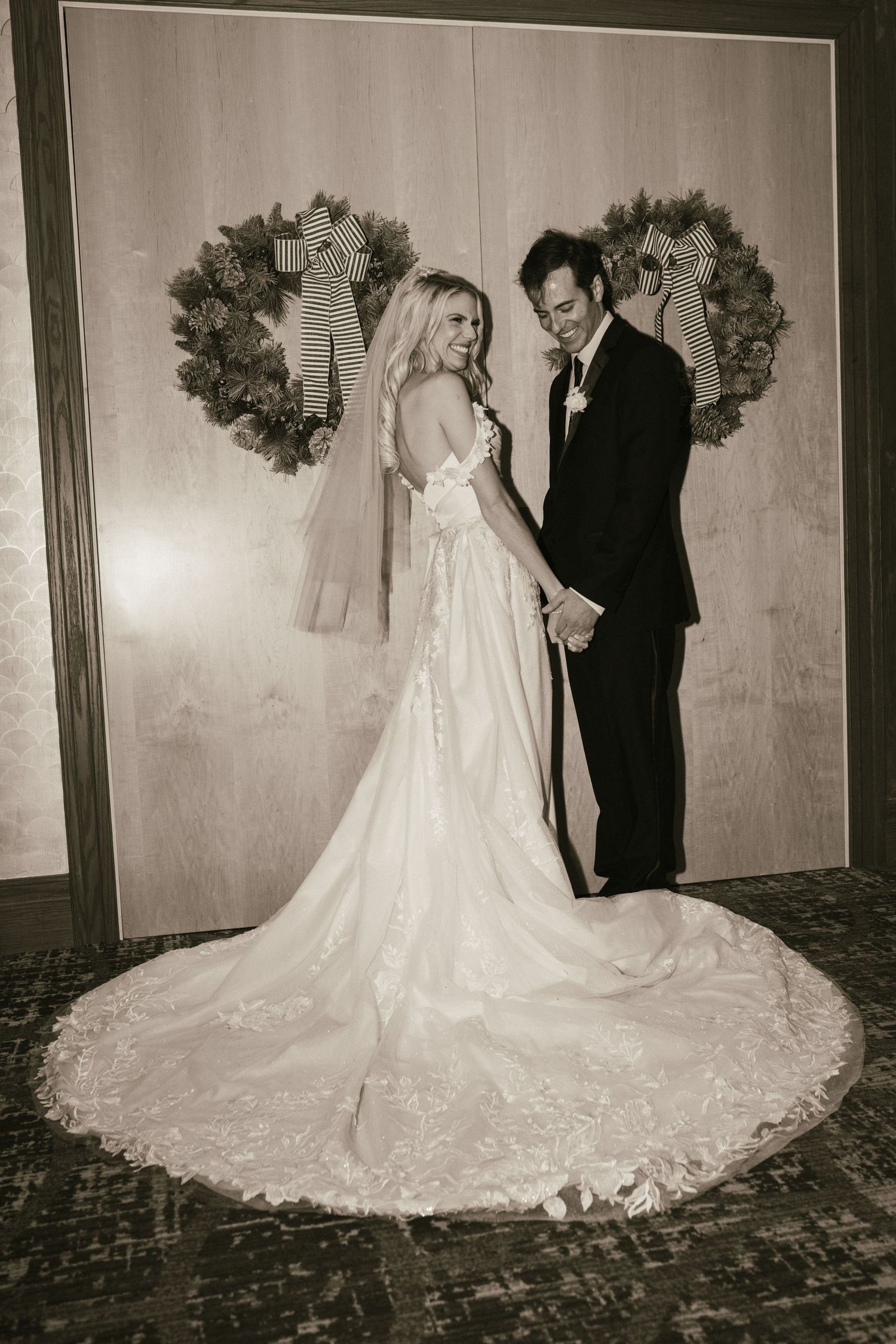 A series of vintage wedding photos showing a bride in a long lace train dress posing with her groom.