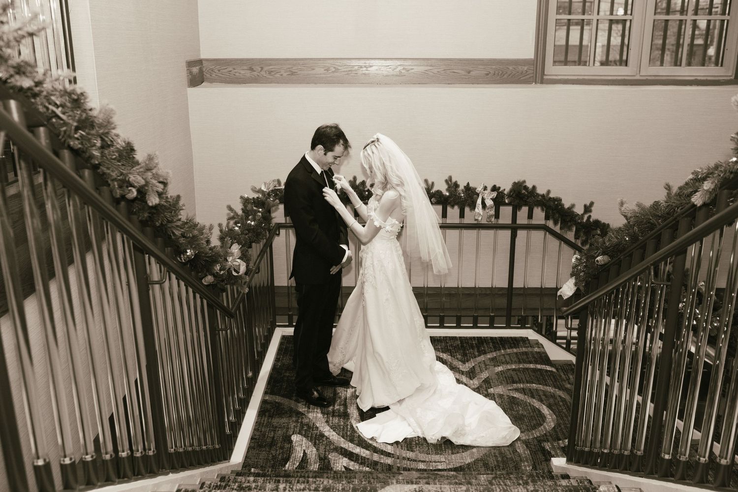 Artistic wedding photography sequence showing dance movements on a decorated staircase.