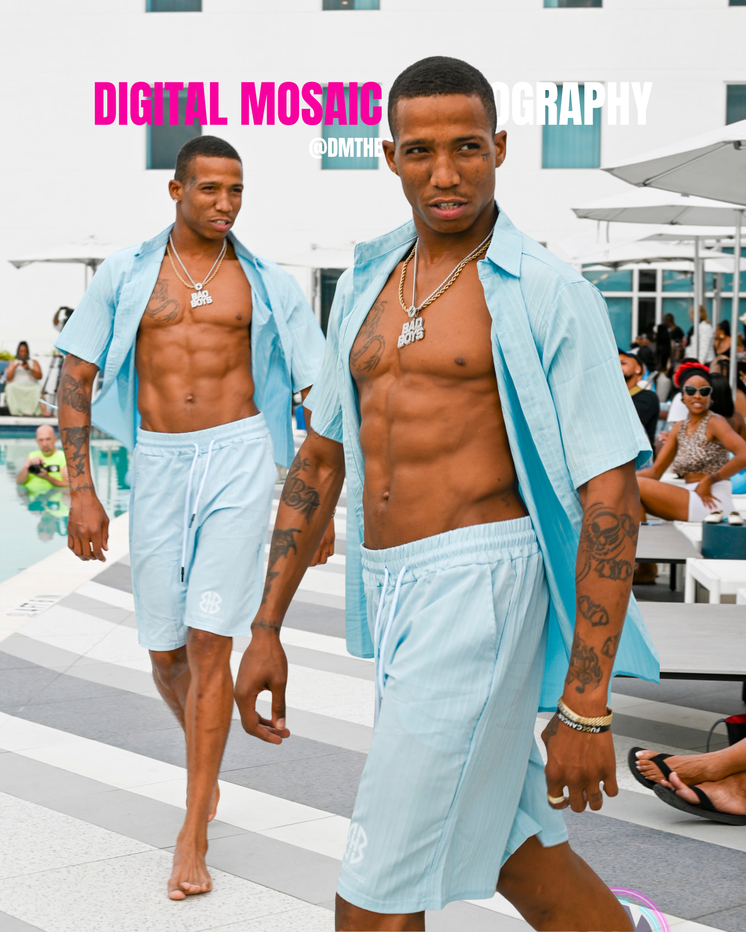 Two shirtless men in matching light blue open shirts and shorts walk poolside at a sunny resort in a digital mosaic photography image.