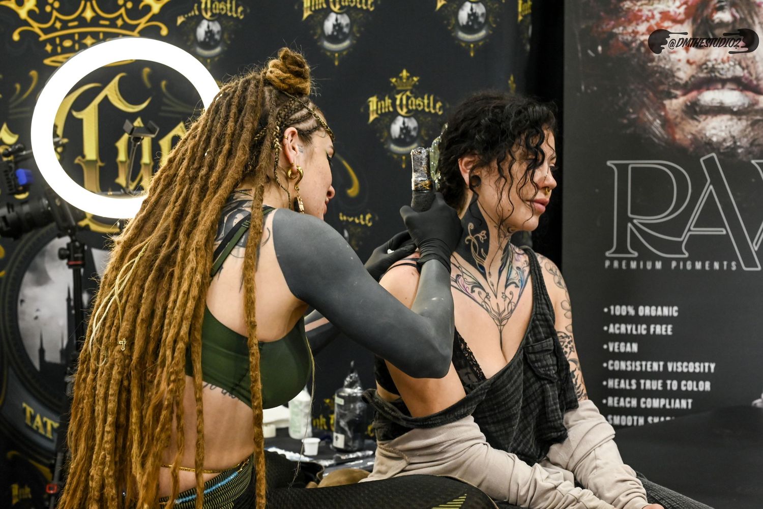 Dark artistic shots of tattoo convention booths with decorative lighting and displays.
