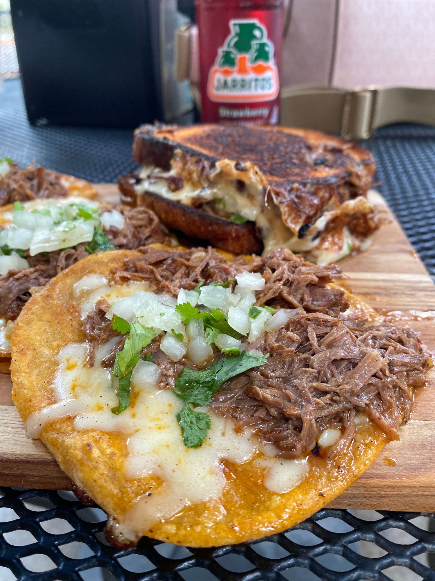 Shredded meat and herbs served on crispy flatbread or tortillas.