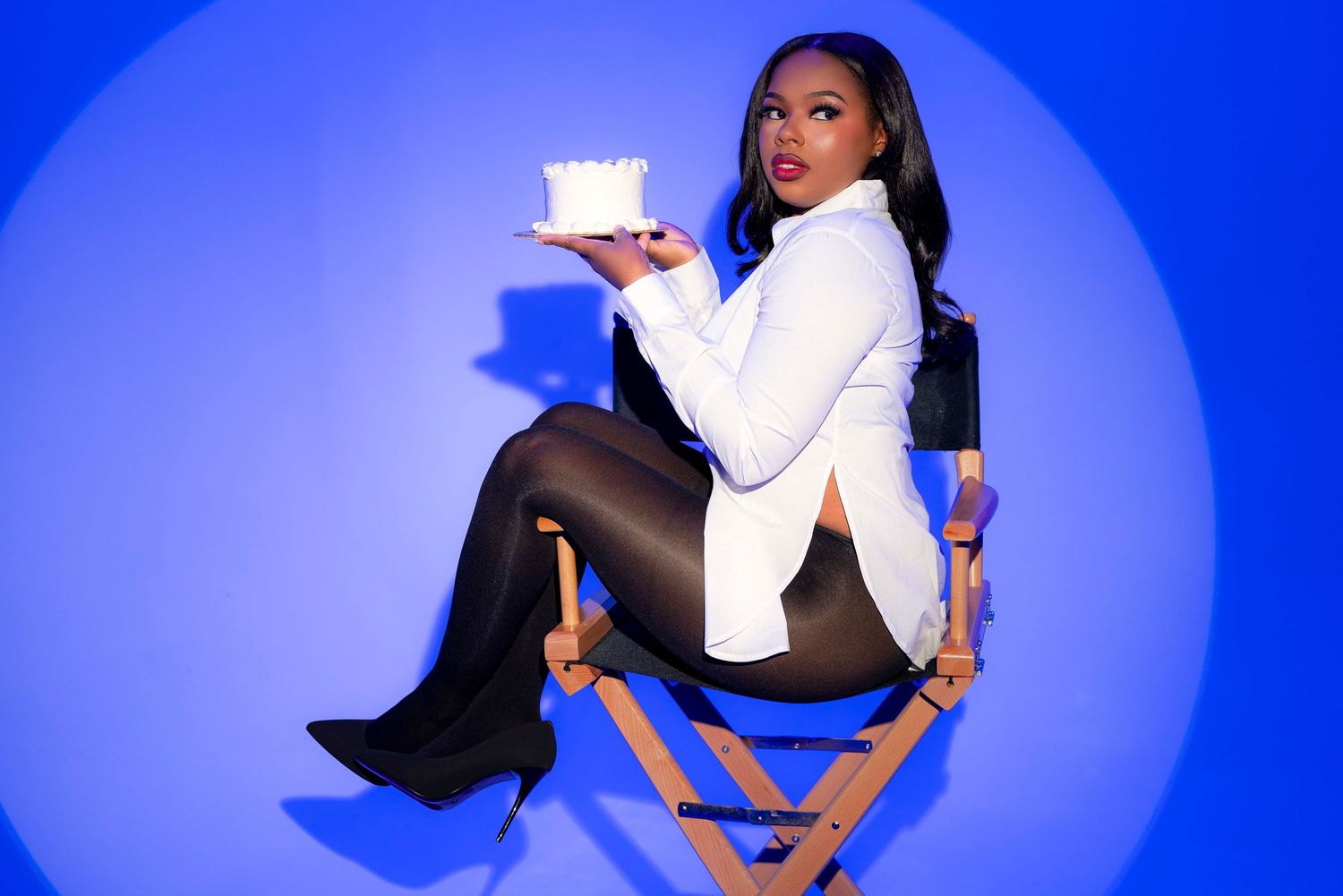 Dynamic photo sequence against blue background showing person in white top and black pants.