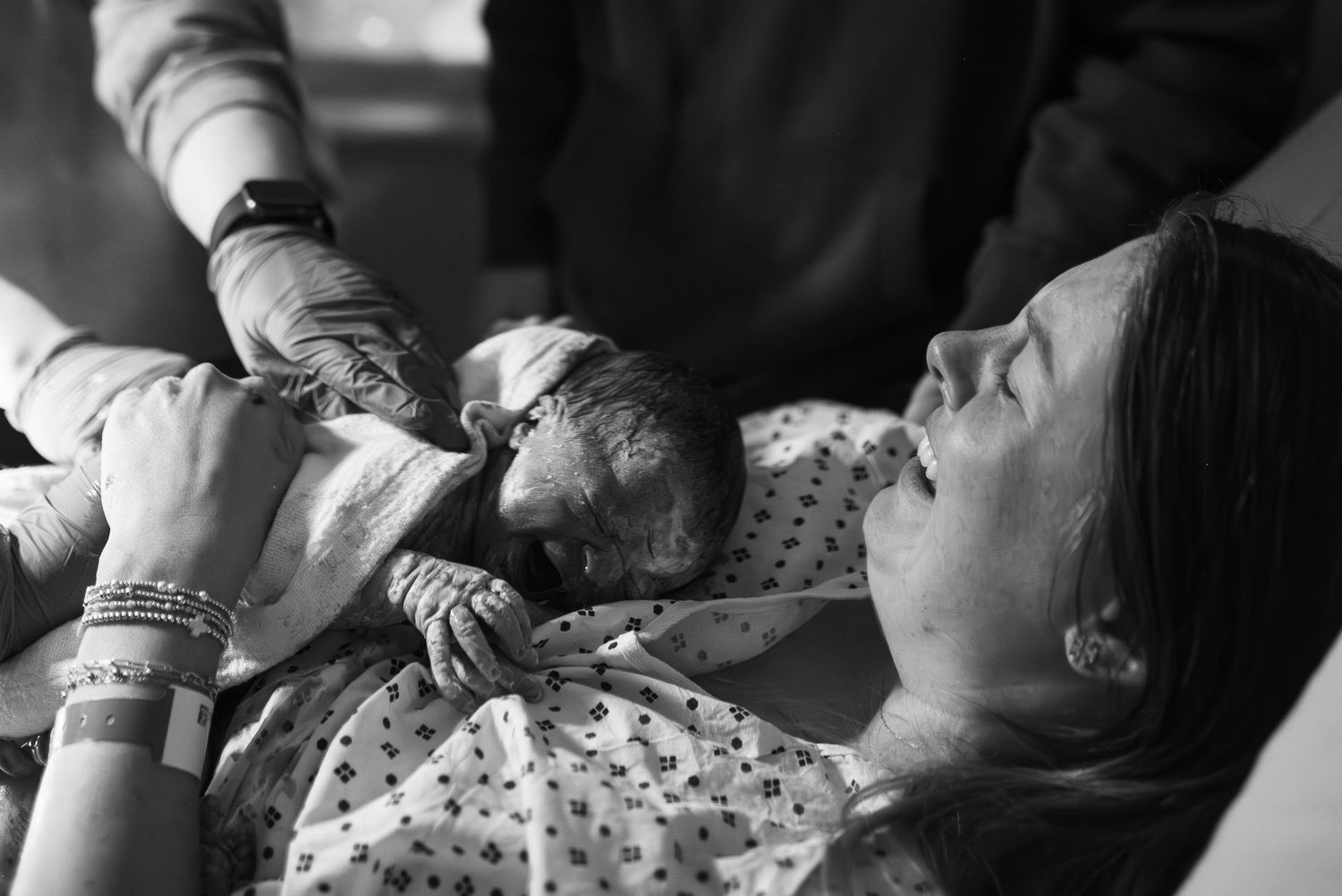 mom and baby after birth at ECU Health Medical Center in Greenville NC. baby on mothers chest. birth photographer