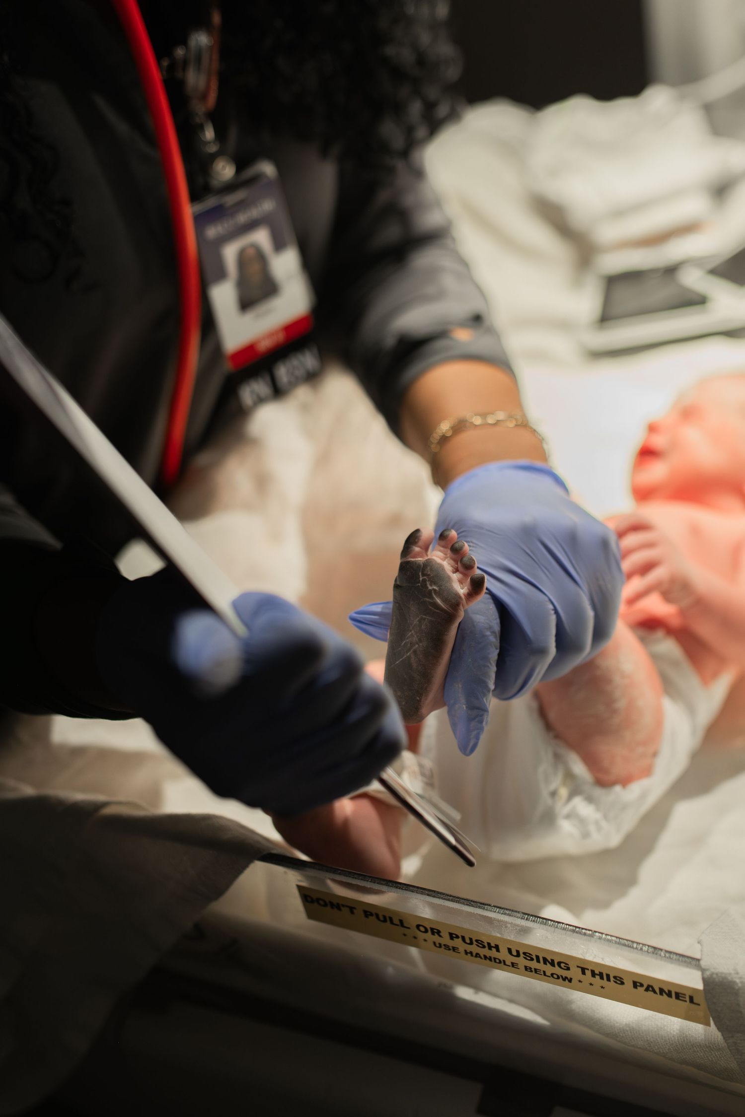 baby girl at birth in hospital at ECU Health Medical Center Greenville NC footprint measurements weight check
