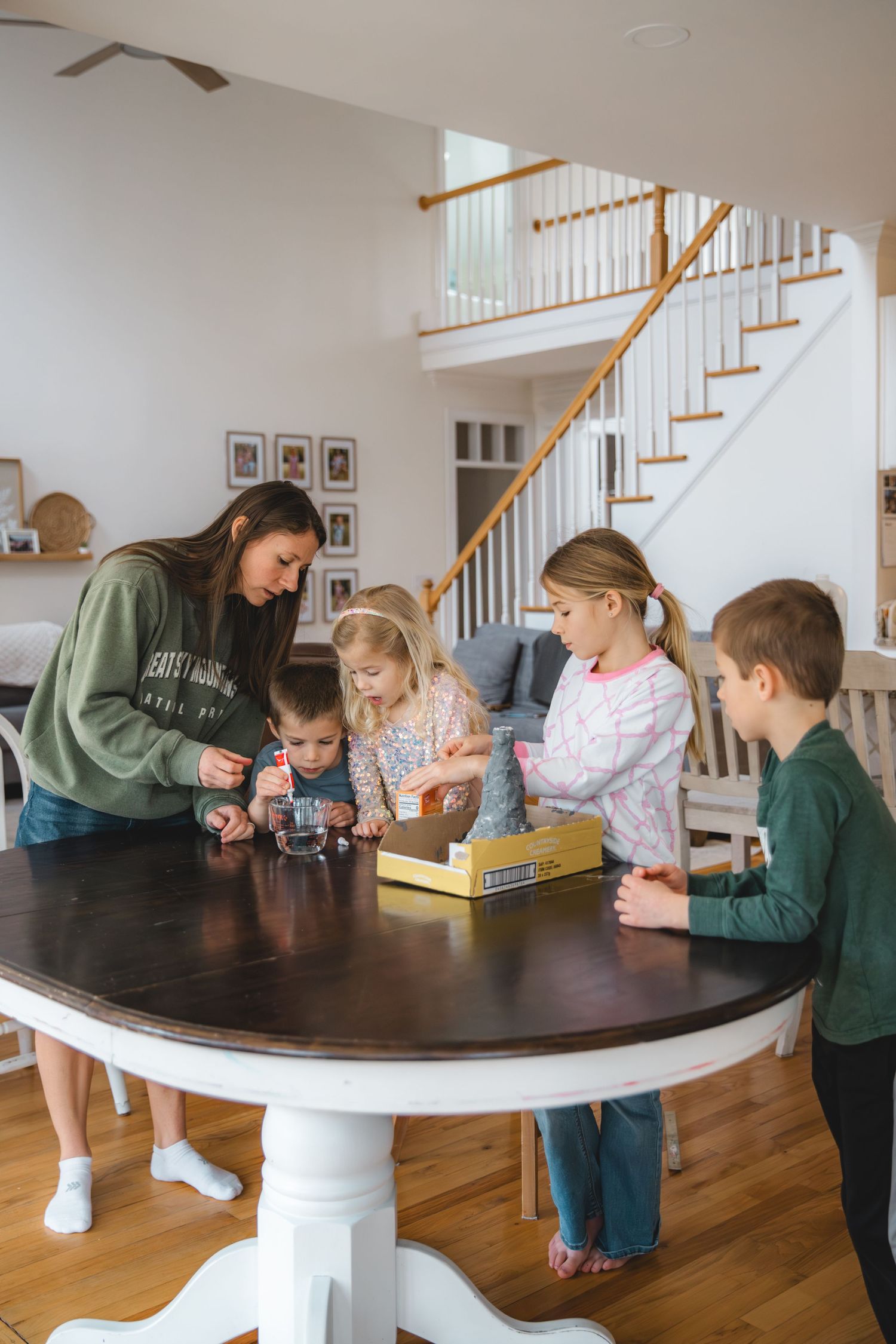 mother, mama, mom, four children, homeschooling, children, homeschool, kitchen table, making volcano, science experiment, greenville, nc