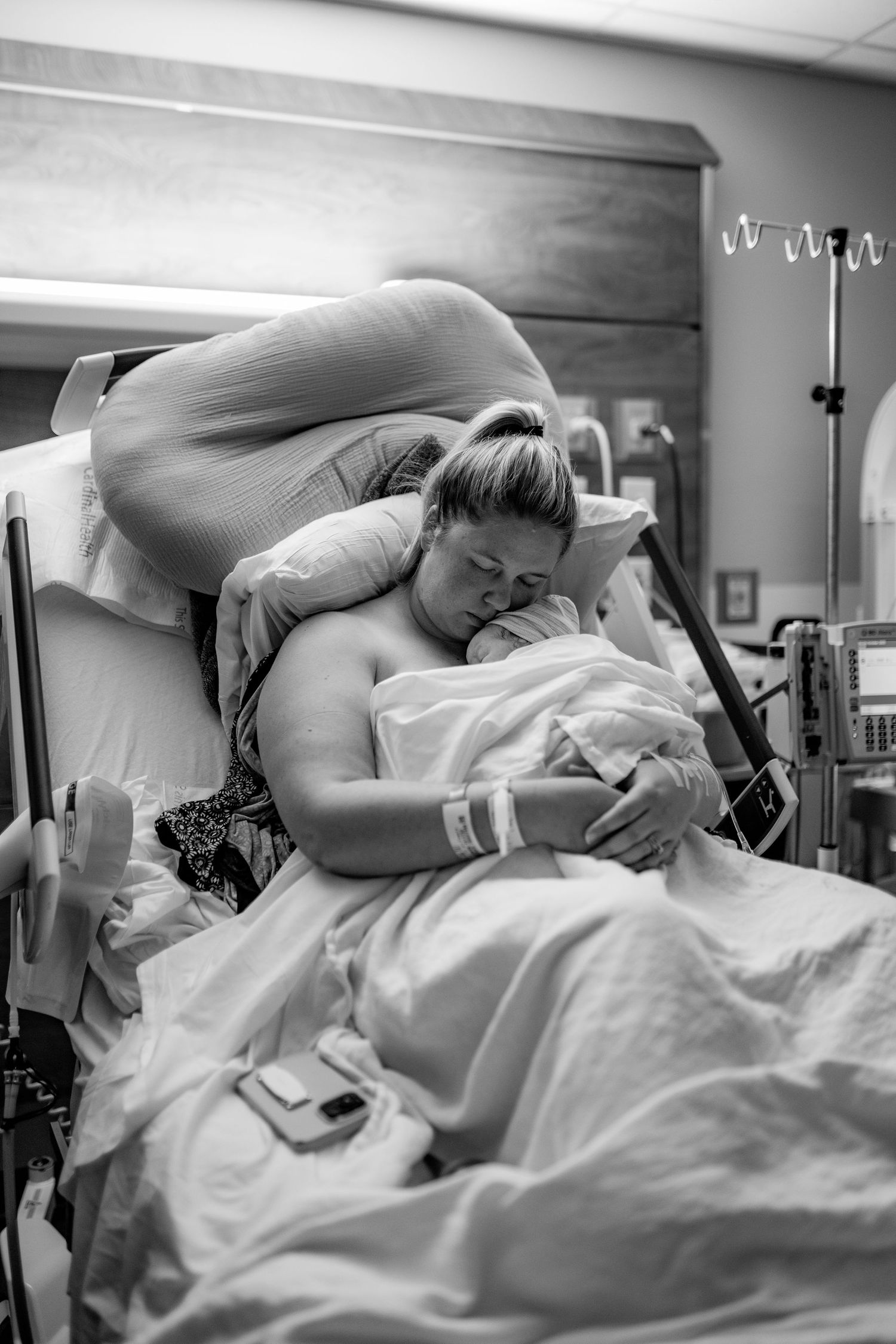 mama and baby. mom and newborn. after birth at ECU Health Medical Center in Greenville NC  Birth photographer. hospital birth