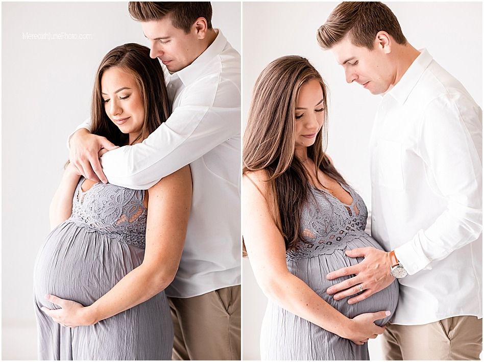 Intimate maternity photos of couple embracing and cradling baby bump against white background.