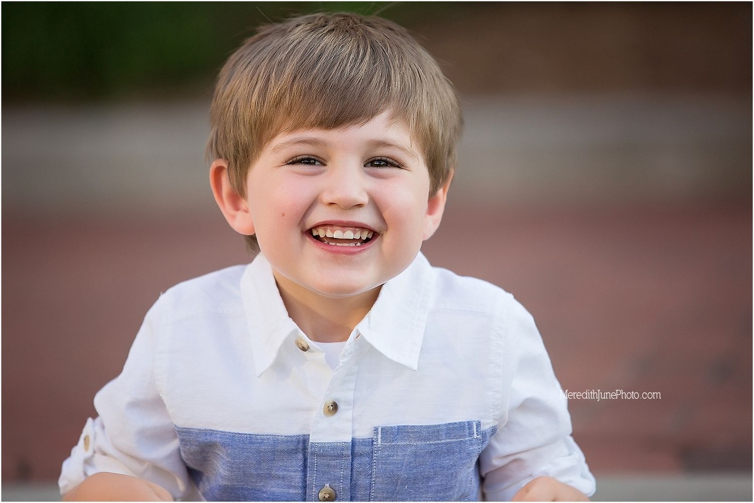 Series of joyful expressions and smiles captured in black and white portraits.