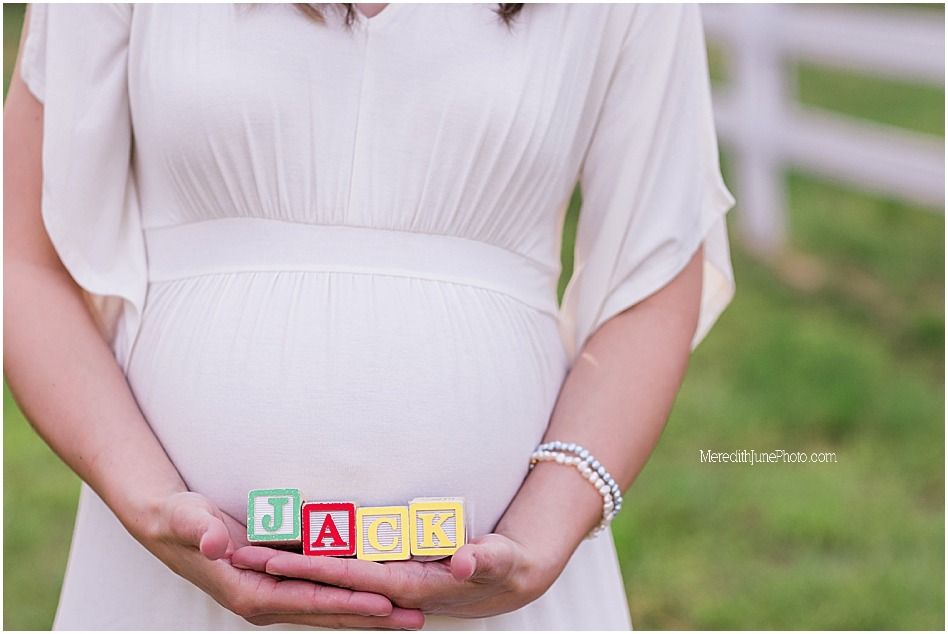 A collection of baby shower photos showing maternity dress details, baby blocks, and belly close-ups in outdoor settings.