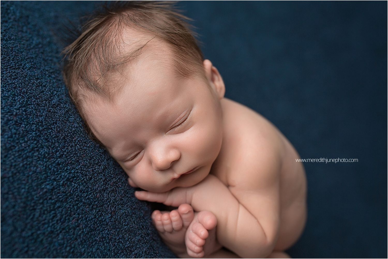 Artistic black and white newborn photography series showing peaceful sleeping baby in various gentle poses.