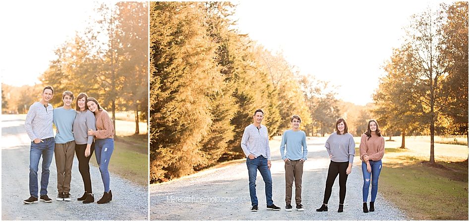 Family members pose together on a tree-lined path during golden hour for outdoor portraits.