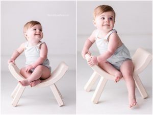 Baby in gray clothing sitting on a pink chair against white background in multiple poses.