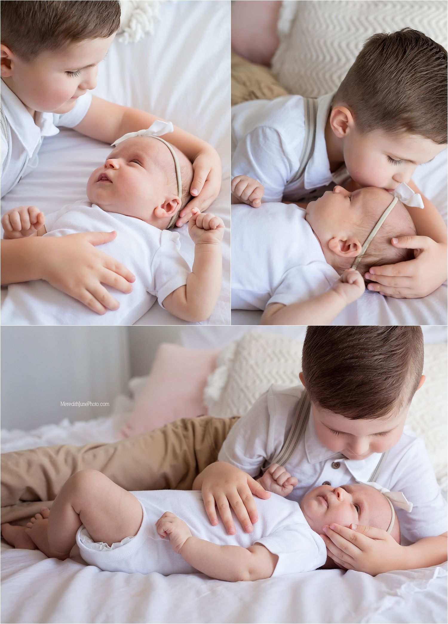 Sweet sibling moment captured in white as older child gently embraces and kisses baby on soft bedding.