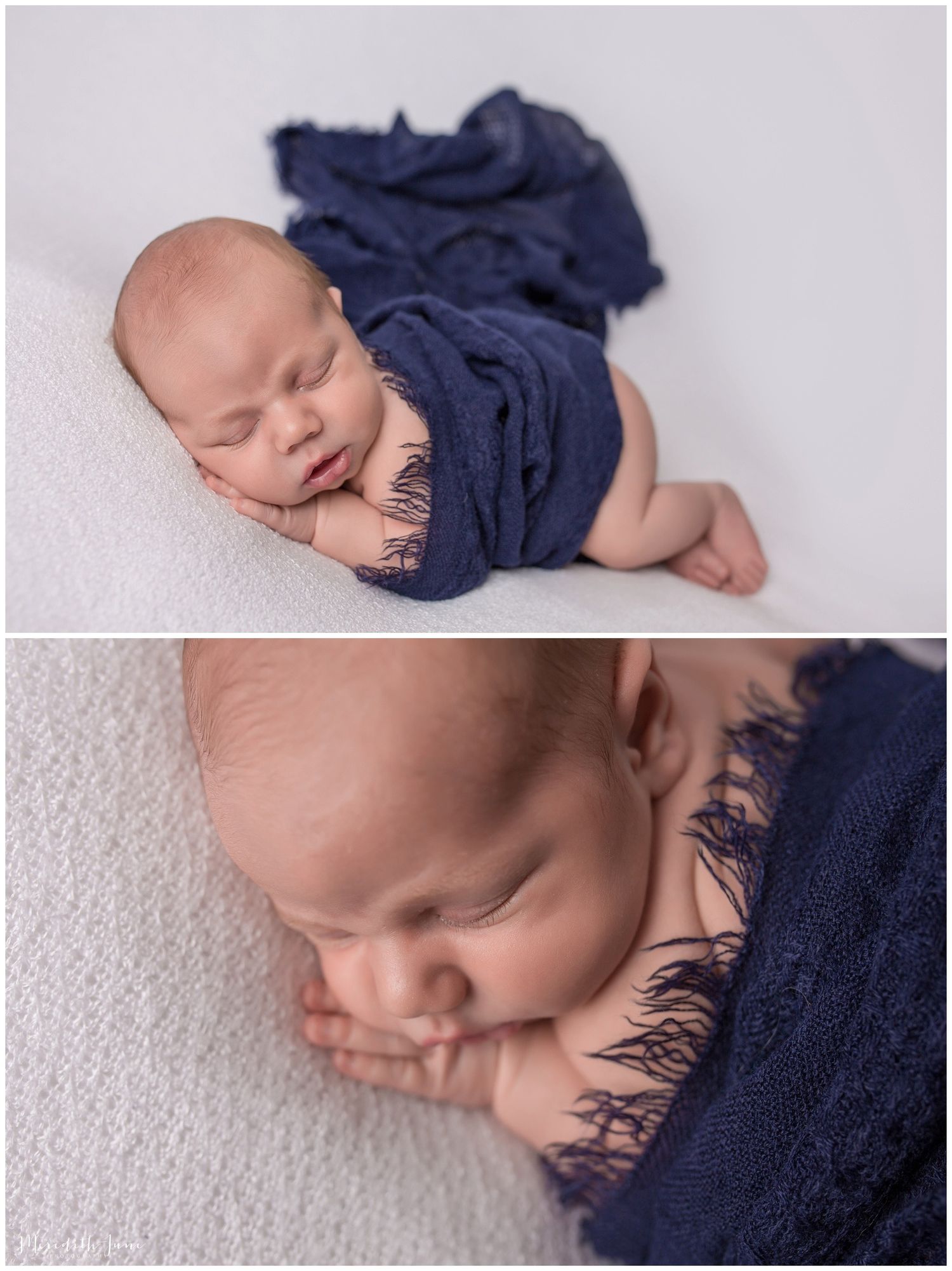Sleeping newborn wrapped in navy blue fabric lying on soft white textured surface in artistic portrait series.