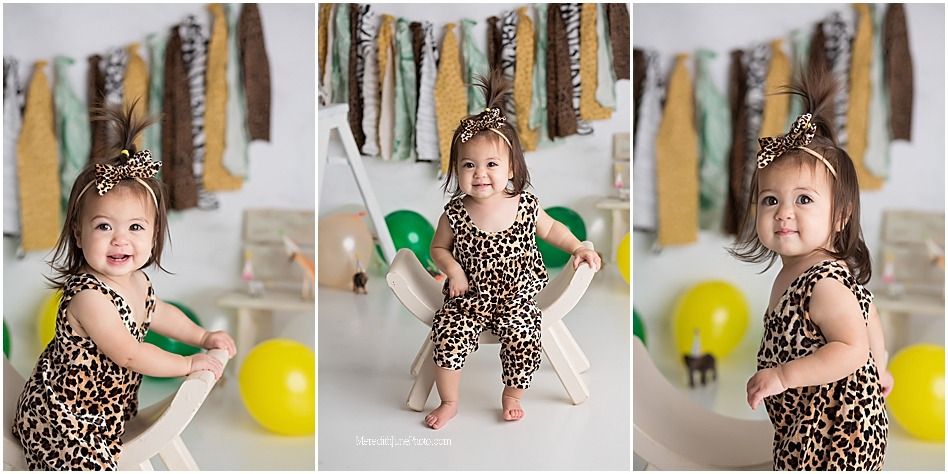Three photos of a child in a leopard print dress sitting on a swing with yellow balloons and fabric garland decorations.