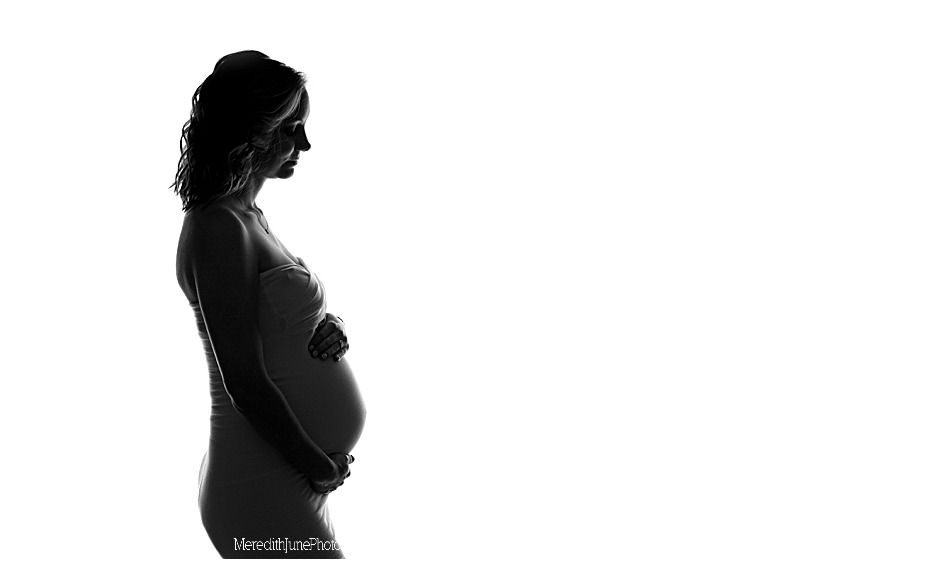 Black silhouettes of people standing in a row against a white background.