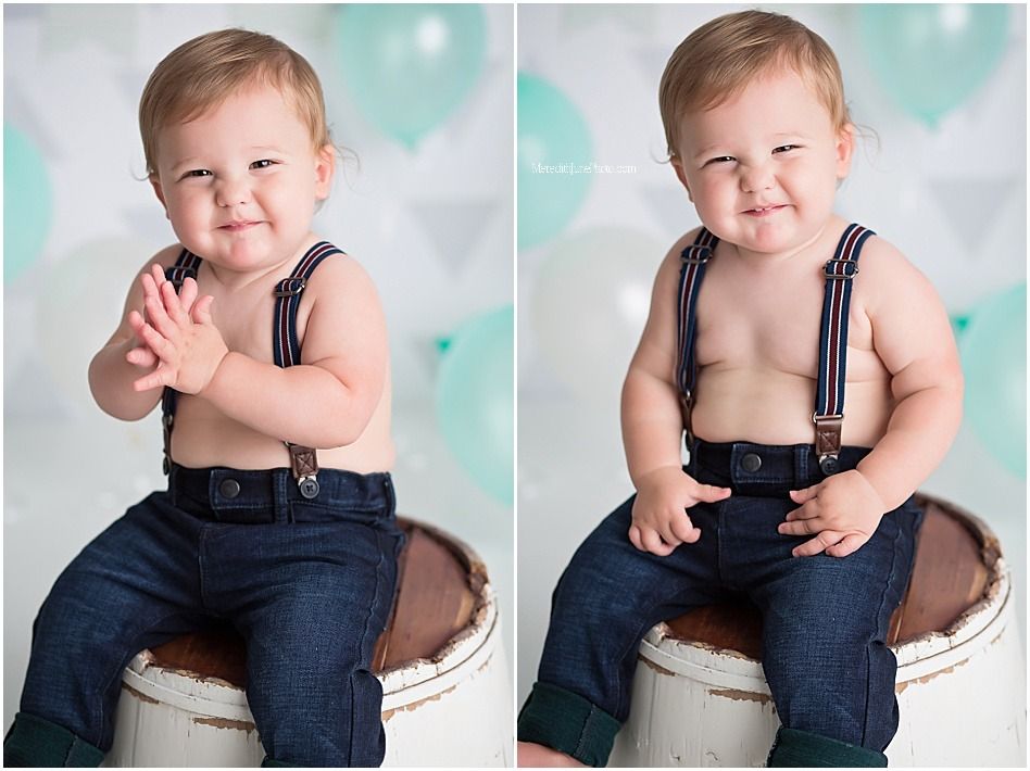 Adorable baby in navy blue overalls poses against a soft teal backdrop in a series of sweet expressions.