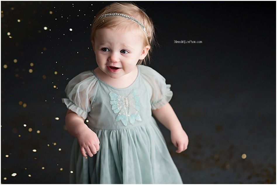 A series of photos showing a child in a mint green dress against a dark background with sparkly elements.