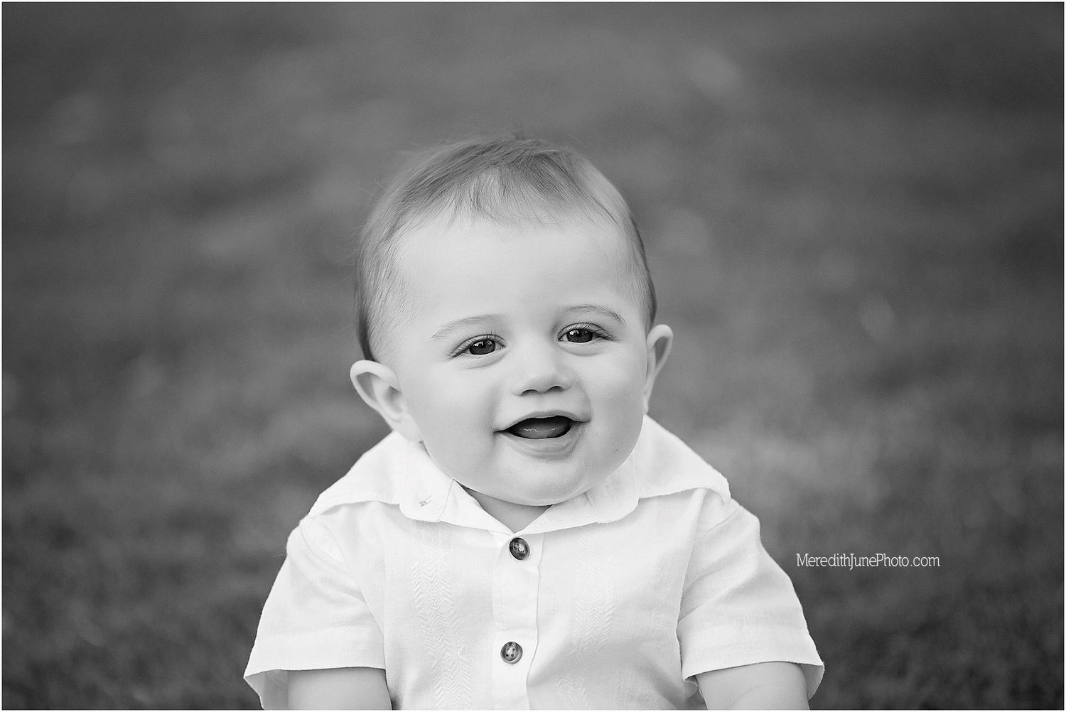 A series of black and white portrait photographs showing a baby's expressions and reactions.