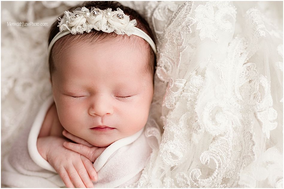 Close-up newborn portraits showing delicate details with white lace and soft lighting effects.