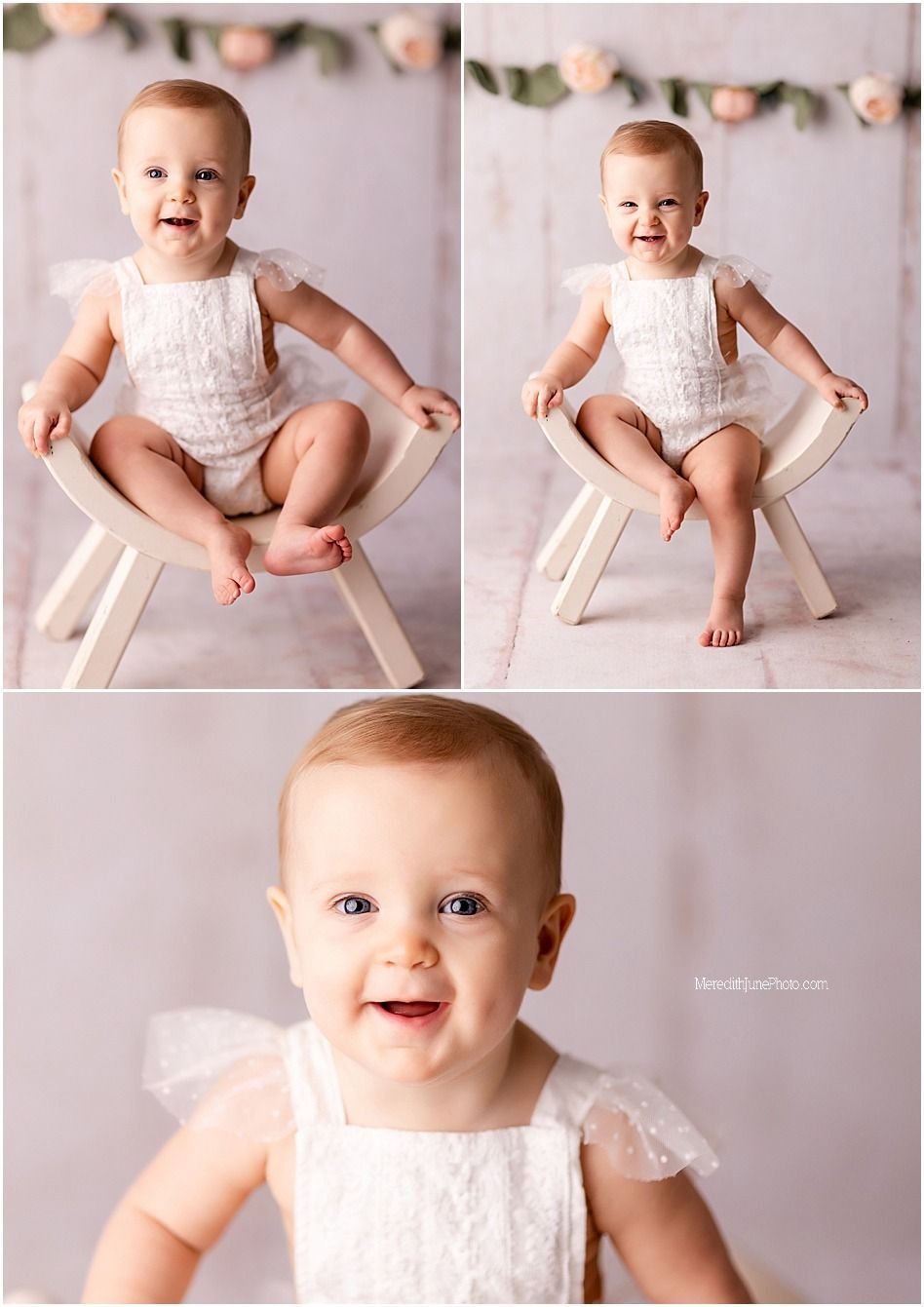 Baby wearing white lace romper poses on wooden prop during professional milestone photo session.