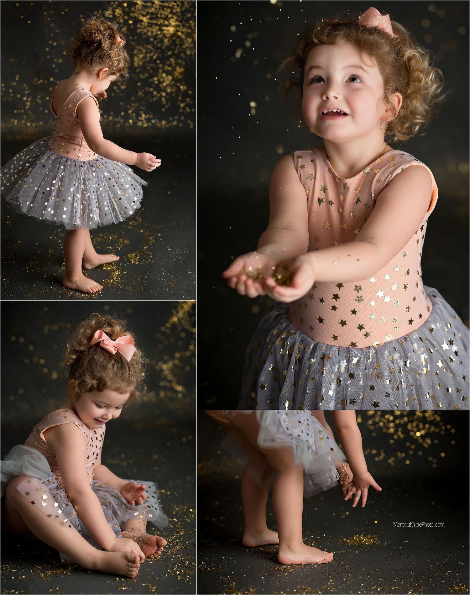 A child in a polka dot dress plays with glittering gold confetti on a dark backdrop during a photo session.