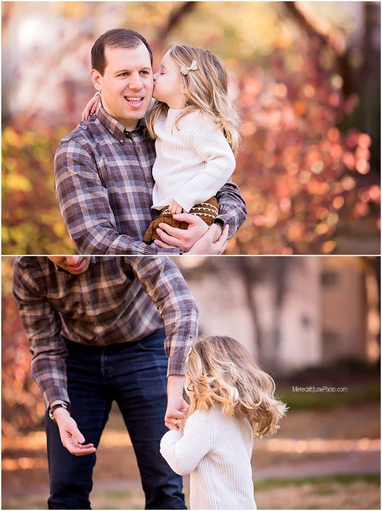 Family autumn portrait session with father and child in plaid shirt against fall foliage.