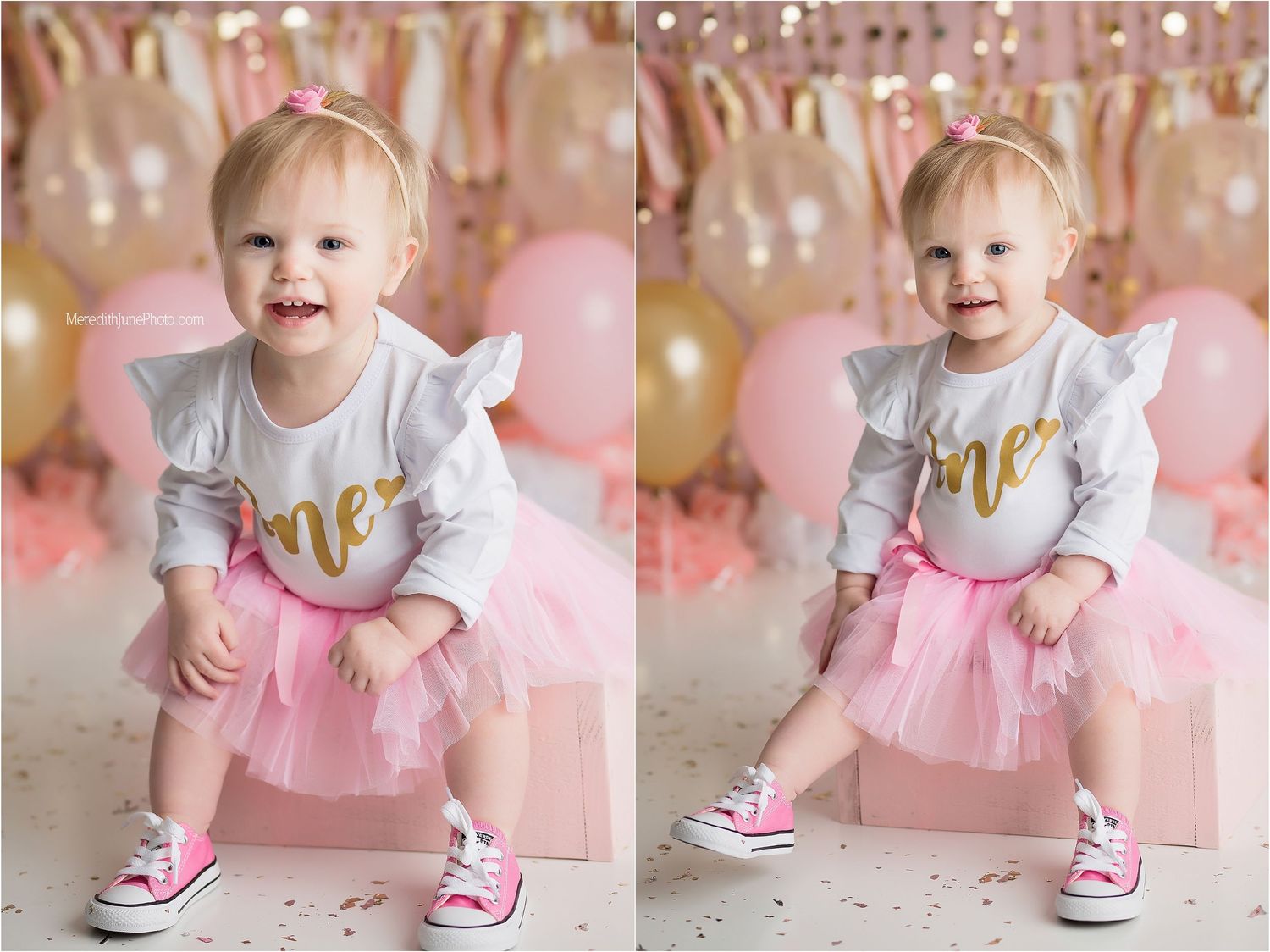 A toddler wearing a gray shirt with 'one' text, pink tutu skirt and pink shoes poses against a pink party backdrop.