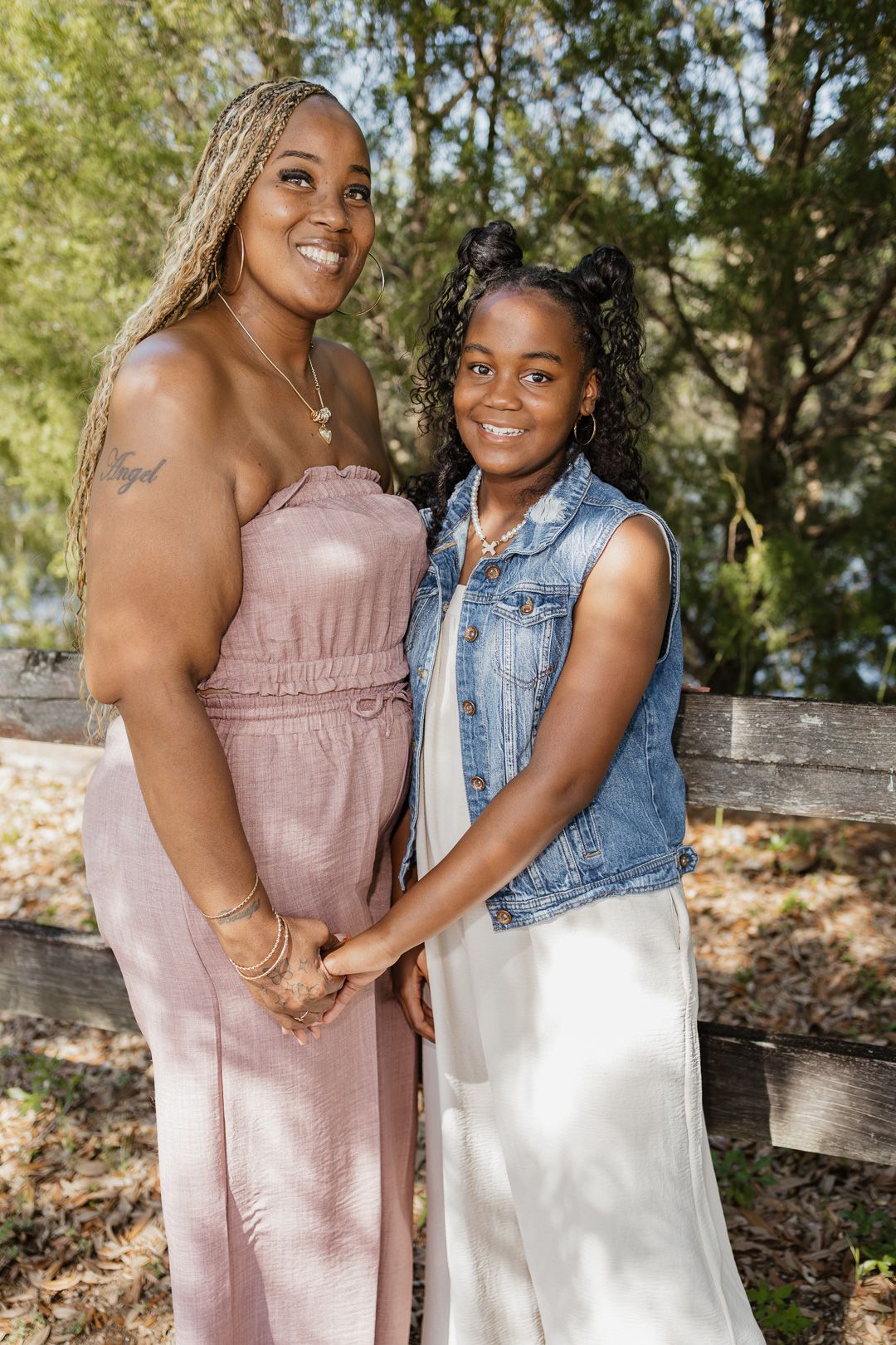 Outdoor family portraits captured in a peaceful park setting in Bagdad, Florida.