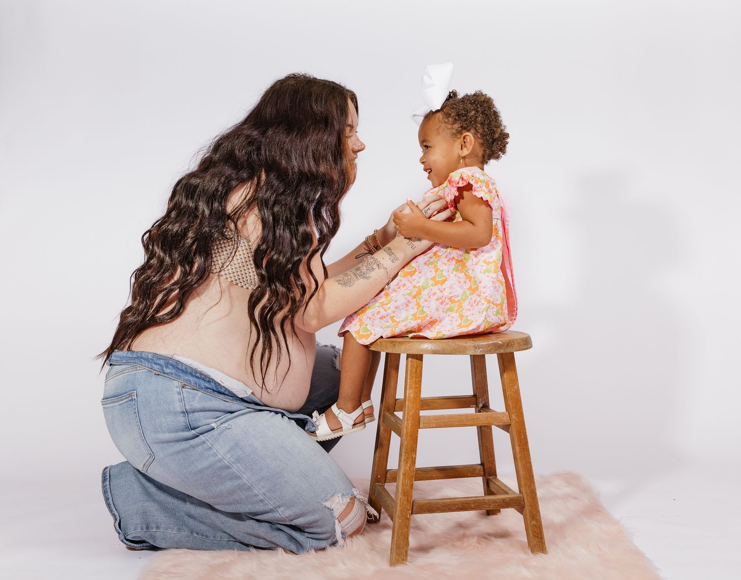 Studio maternity photographer serving Milton, Pensacola, Pace, and surrounding Northwest Florida areas.