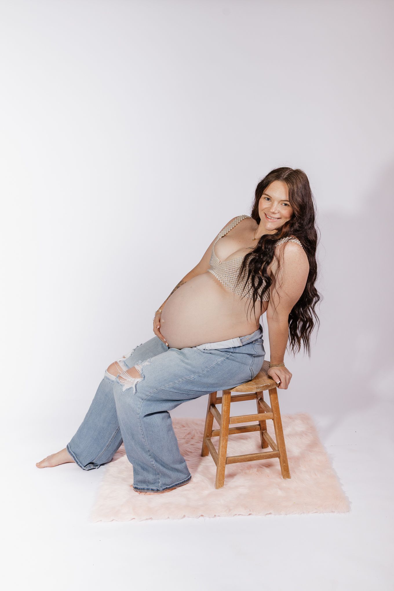 Studio maternity photographer serving Milton, Pensacola, Pace, and surrounding Northwest Florida areas.