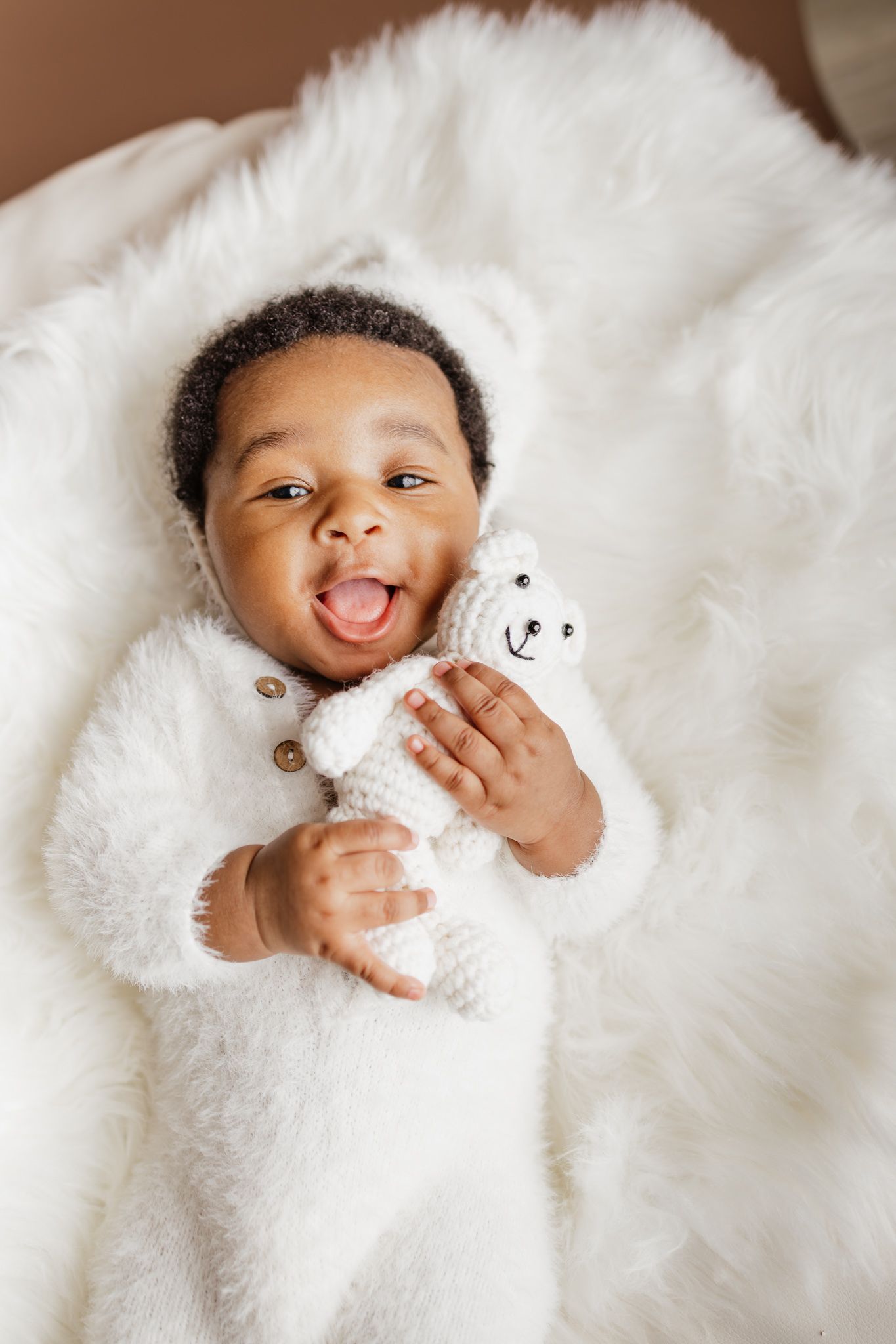 Travel Studio newborn photographer serving Milton, Pensacola, Pace, and surrounding Northwest Florida areas.