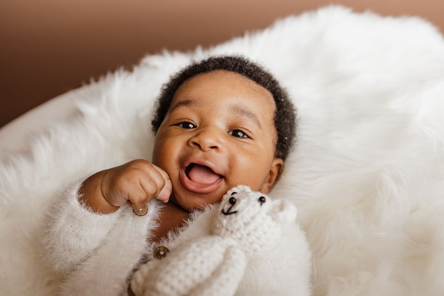 Travel Studio newborn photographer serving Milton, Pensacola, Pace, and surrounding Northwest Florida areas.
